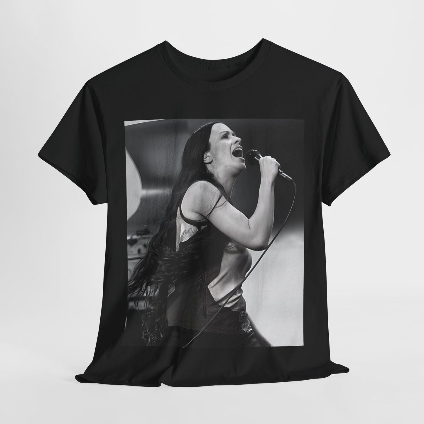 A black graphic t-shirt featuring a concert graphic for Alanis Morissette's 'Jagged Little Pill' Tour from 1995, with tour branding.