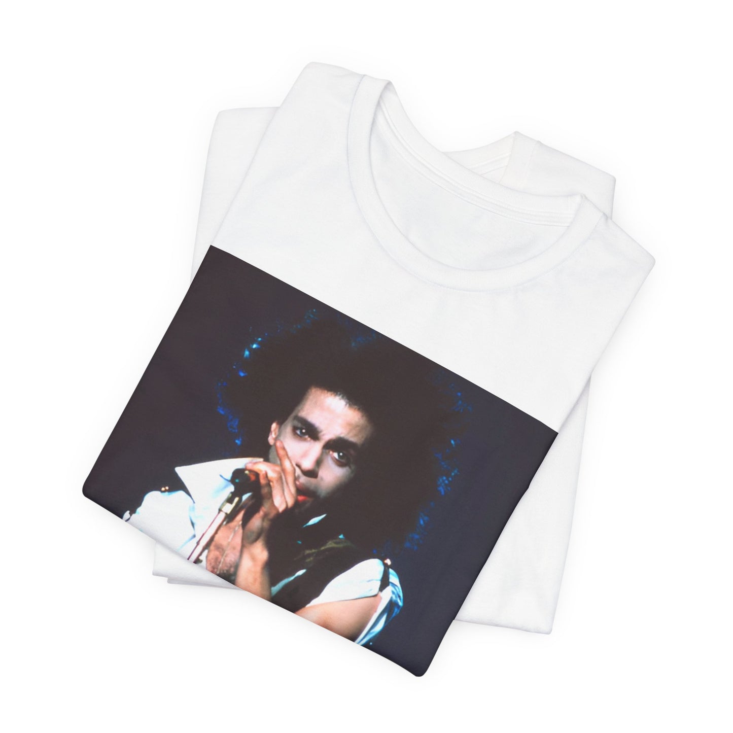 A black graphic t-shirt featuring a 90s live performance graphic of Prince.