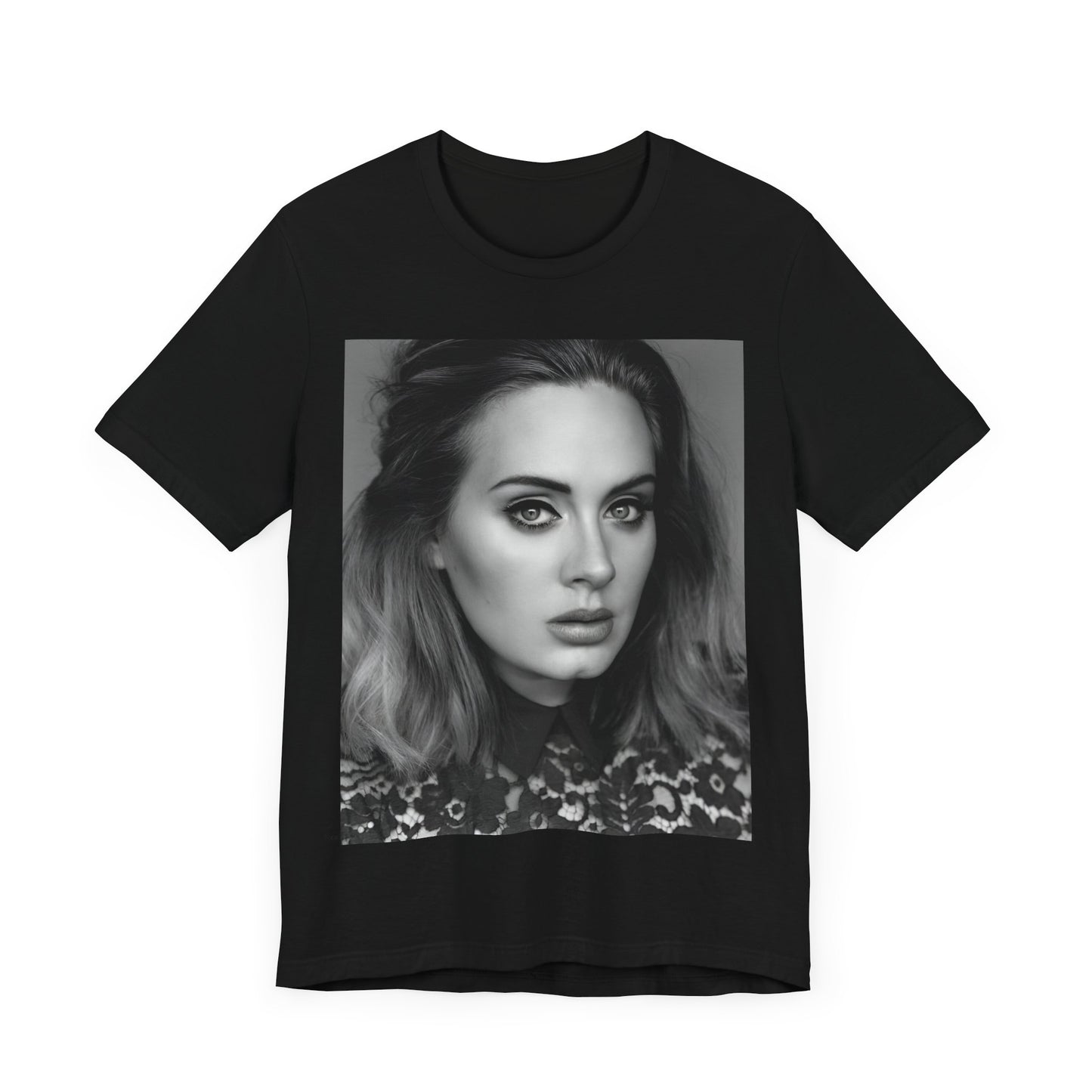 A black graphic t-shirt featuring a classic black and white, monochrome portrait of Adele, showing her with a serene or thoughtful expression.