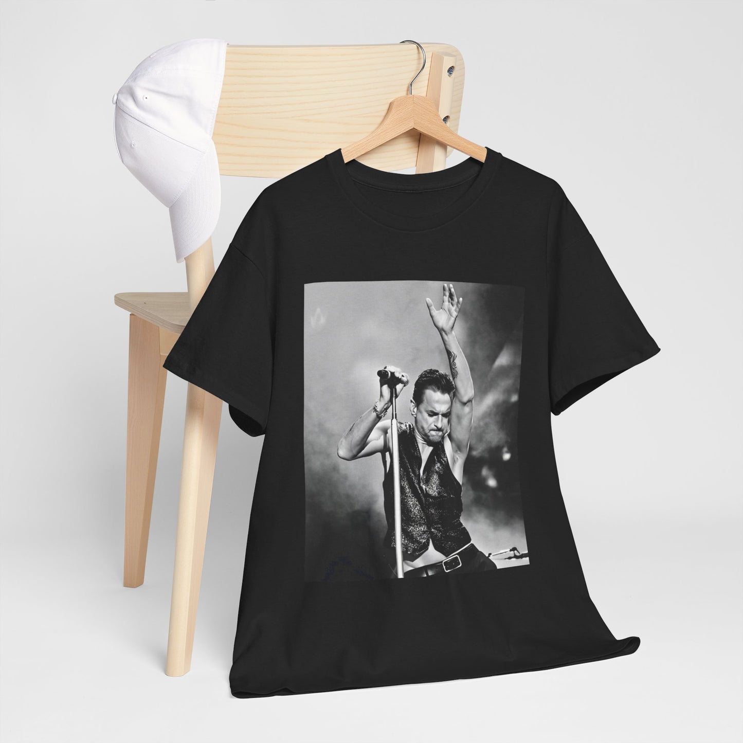 A black graphic t-shirt featuring a graphic or photo of Depeche Mode performing live on stage from the 'Personal Jesus' era.