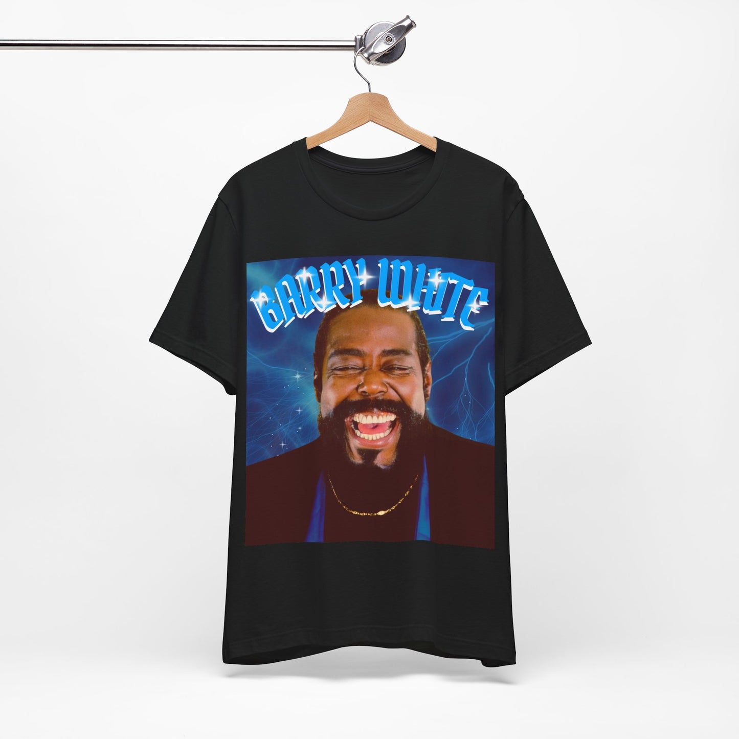 A black graphic t-shirt featuring a vintage 70s-style graphic of Barry White, emphasizing his smooth, iconic look.