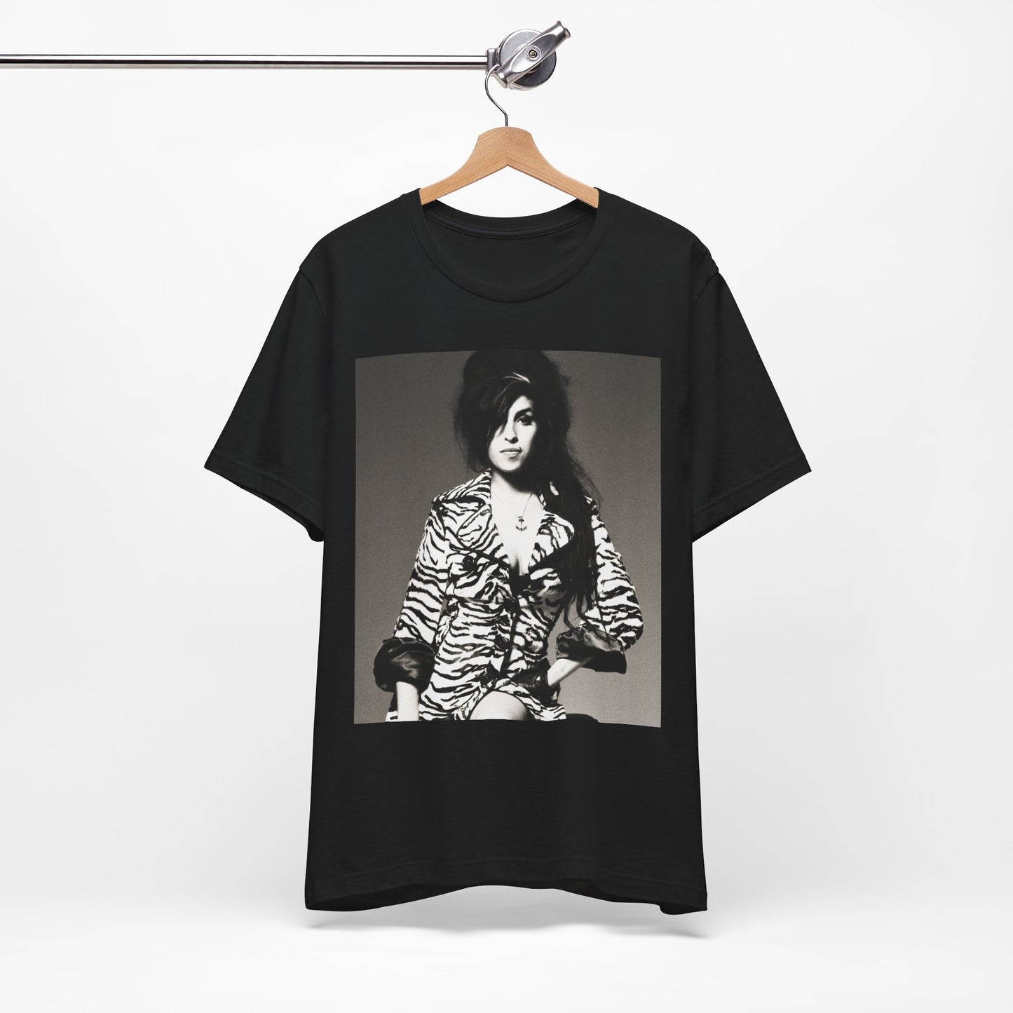 A black graphic t-shirt featuring a graphic related to Amy Winehouse's 'Back to Black' album era from 2006, possibly with album art elements.