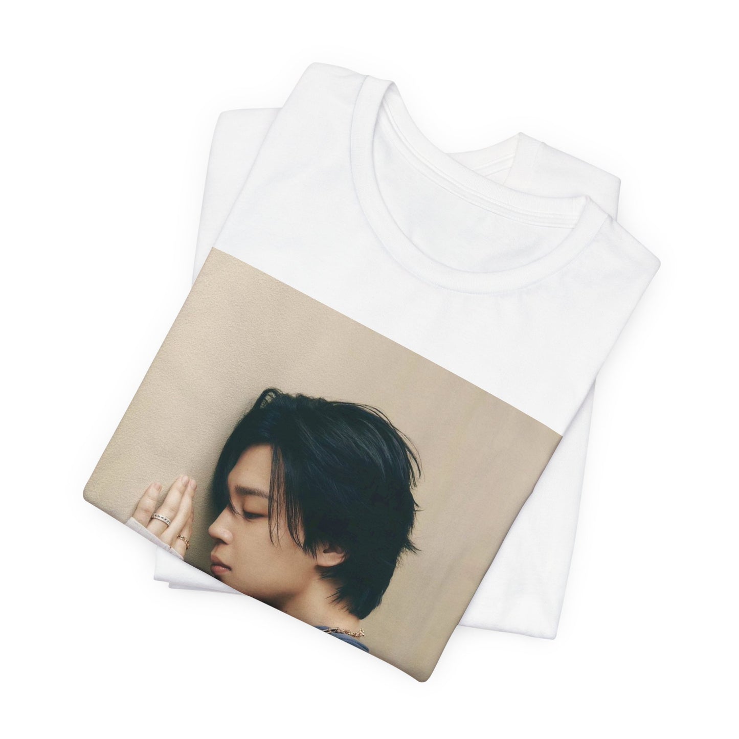 A black graphic t-shirt featuring a cool K-Pop idol essential graphic of Jimin.