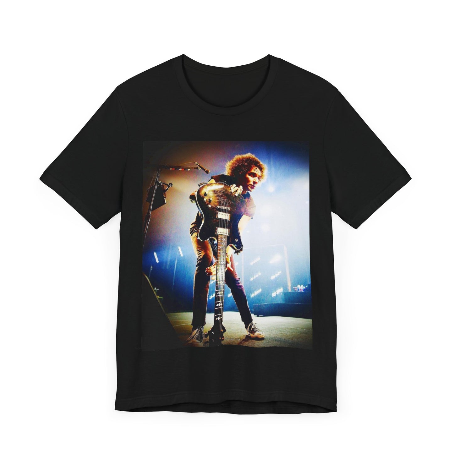 A black graphic t-shirt featuring a concert graphic for Alice In Chains' 2019 live show, with modern band imagery.