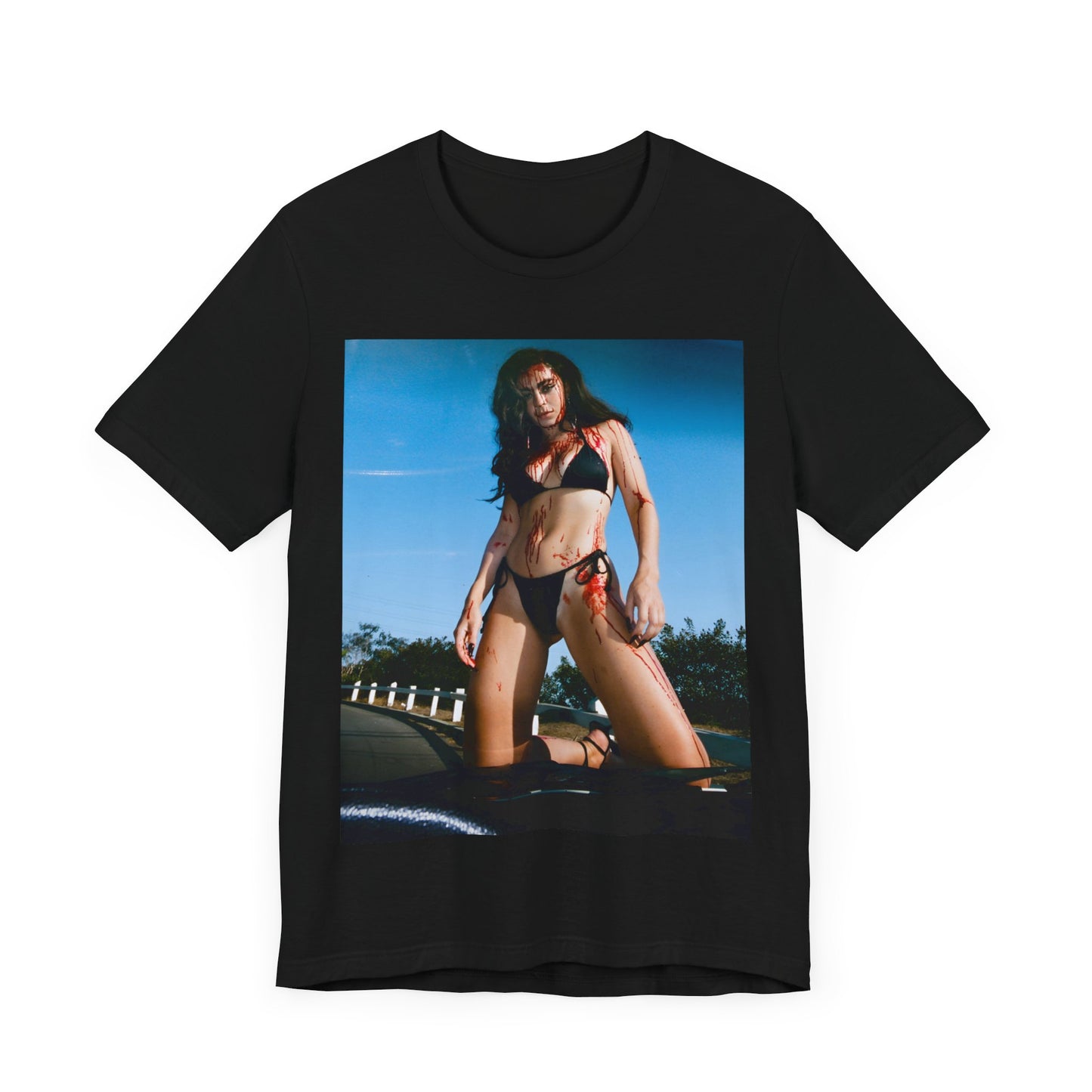 A black graphic t-shirt featuring the album cover art for Charli XCX's 'CRASH' album.