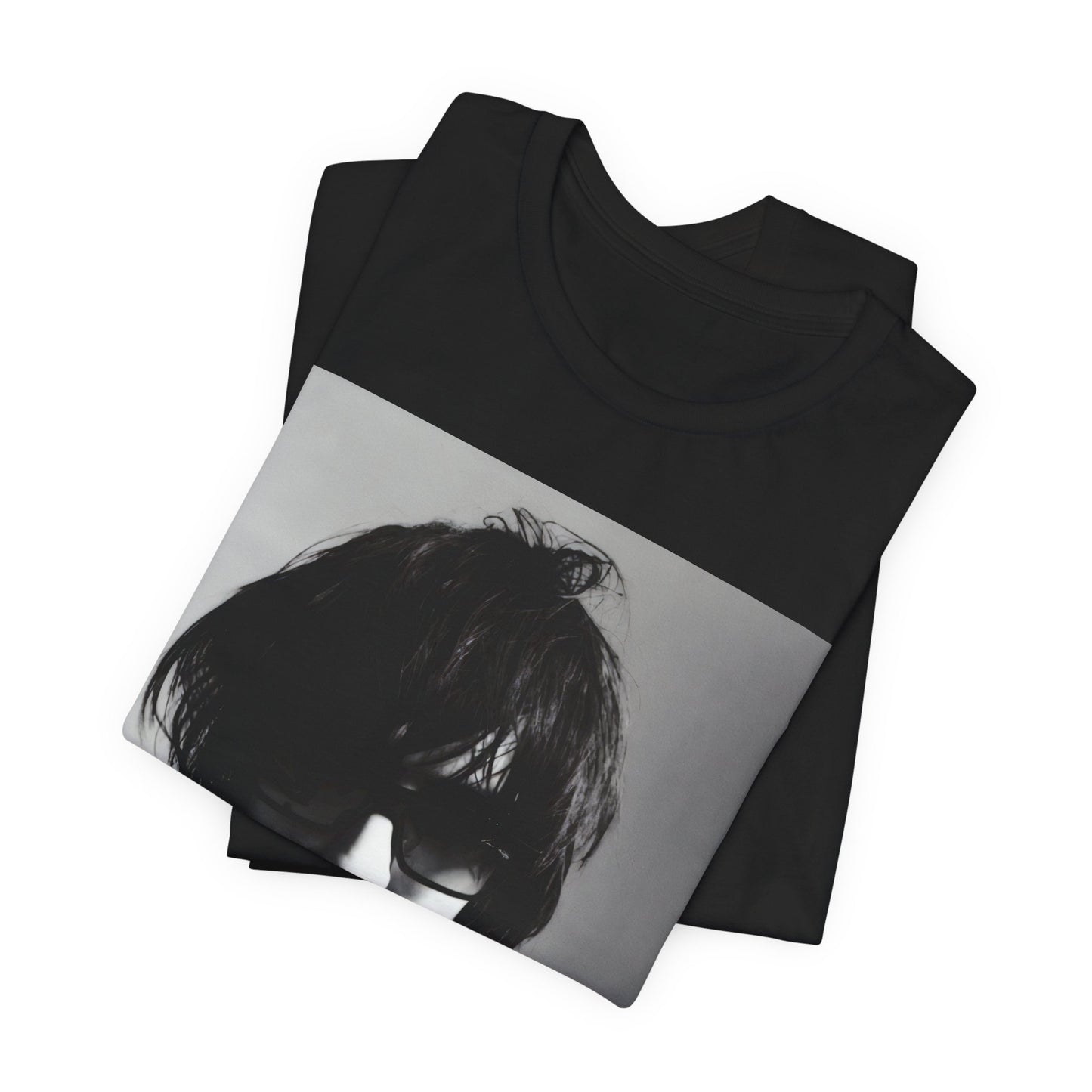 A black graphic t-shirt featuring a graphic related to The Strokes' 'Reptilia' song or era.