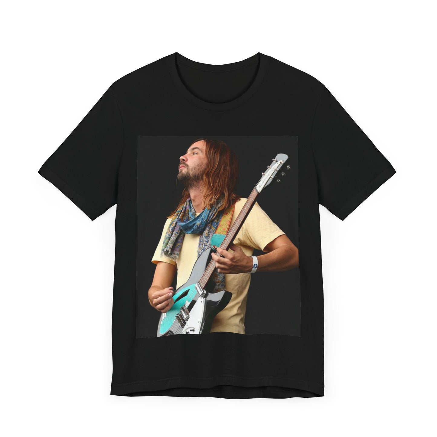 A black graphic t-shirt featuring a vintage indie rock graphic of Tame Impala.