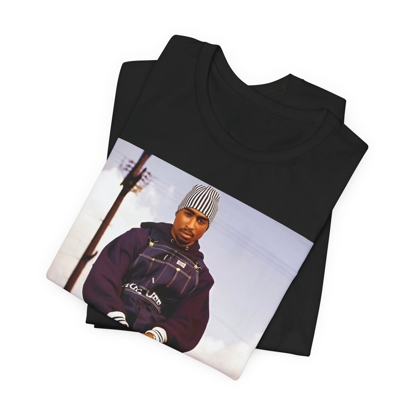 A black graphic t-shirt featuring a timeless rap legend graphic of Tupac.