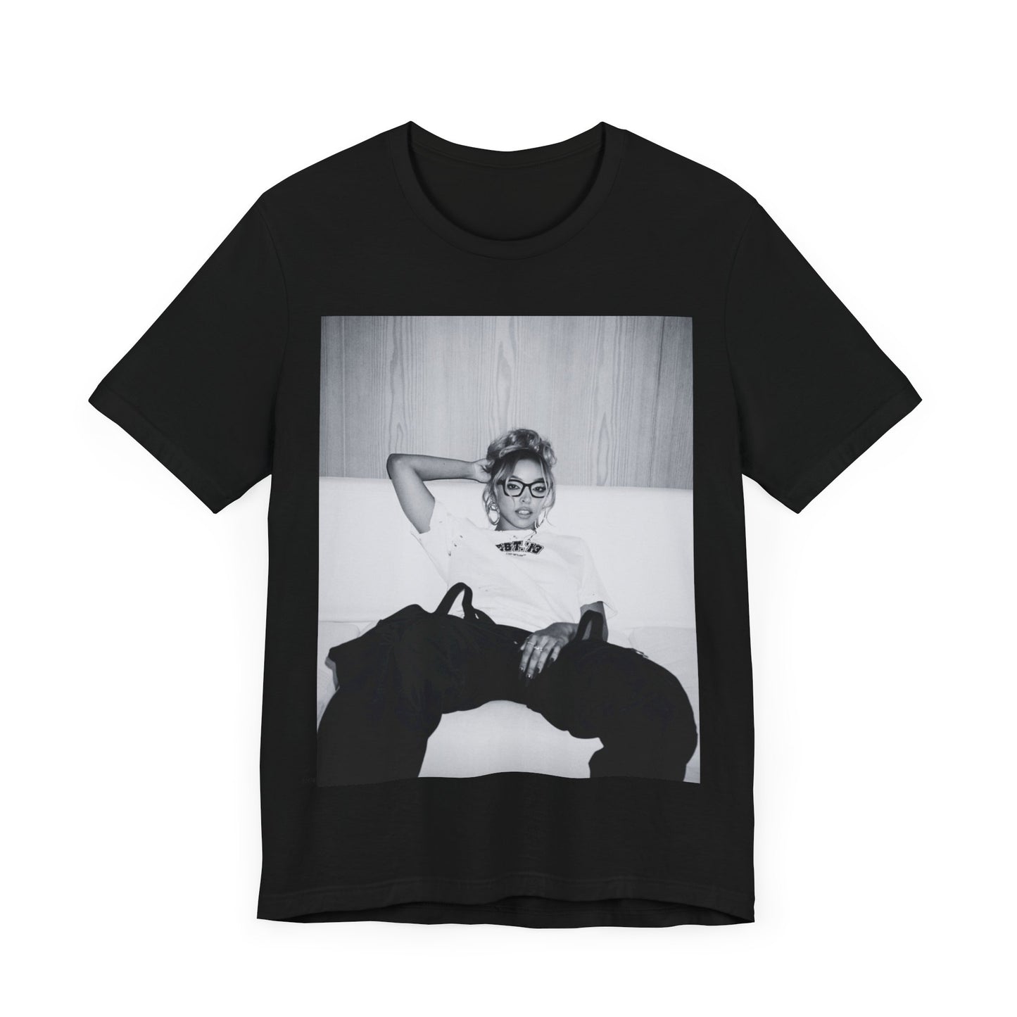 A black graphic t-shirt featuring a black and white portrait photo of Tinashe.