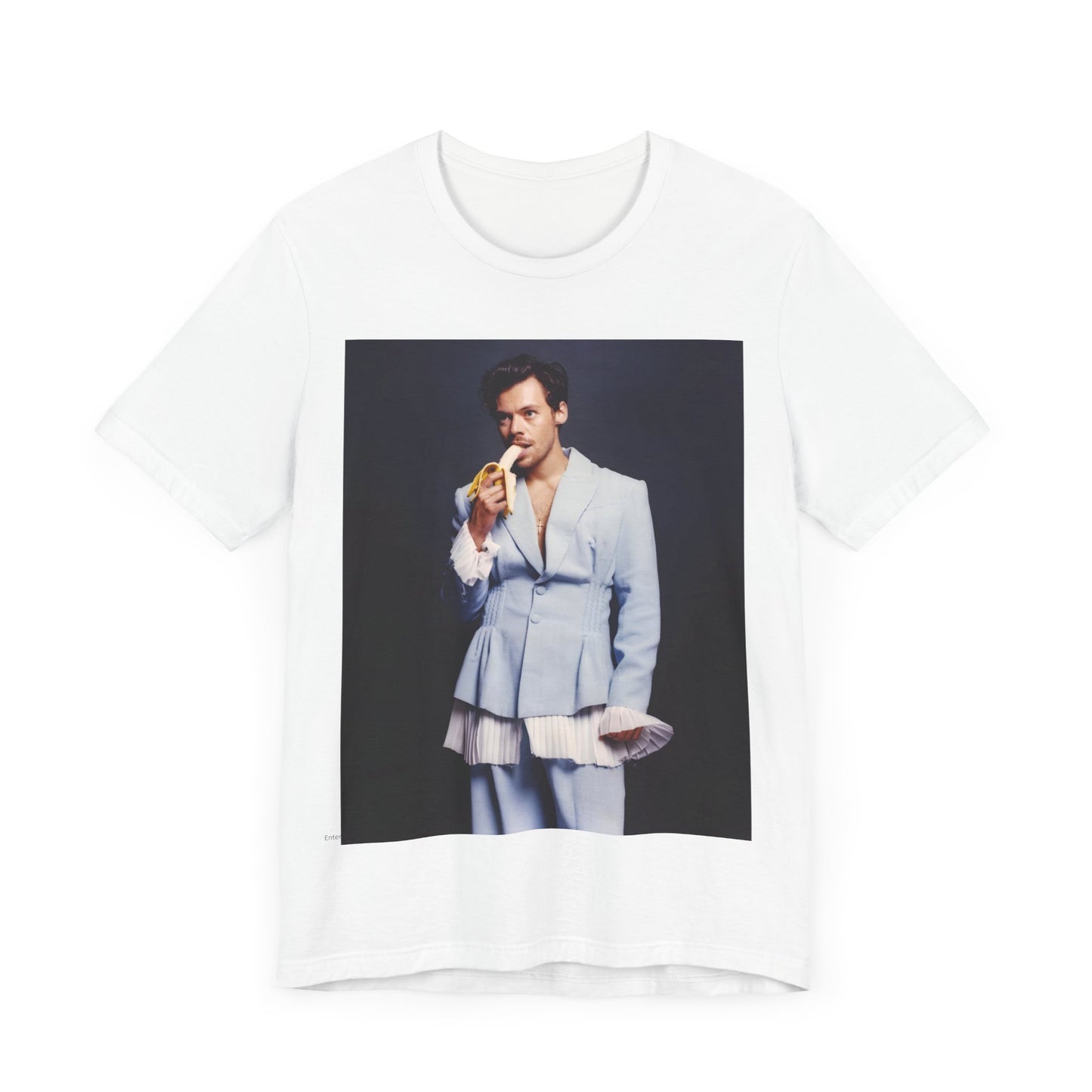 A black graphic t-shirt featuring a graphic related to Harry Styles and his One Direction legacy.