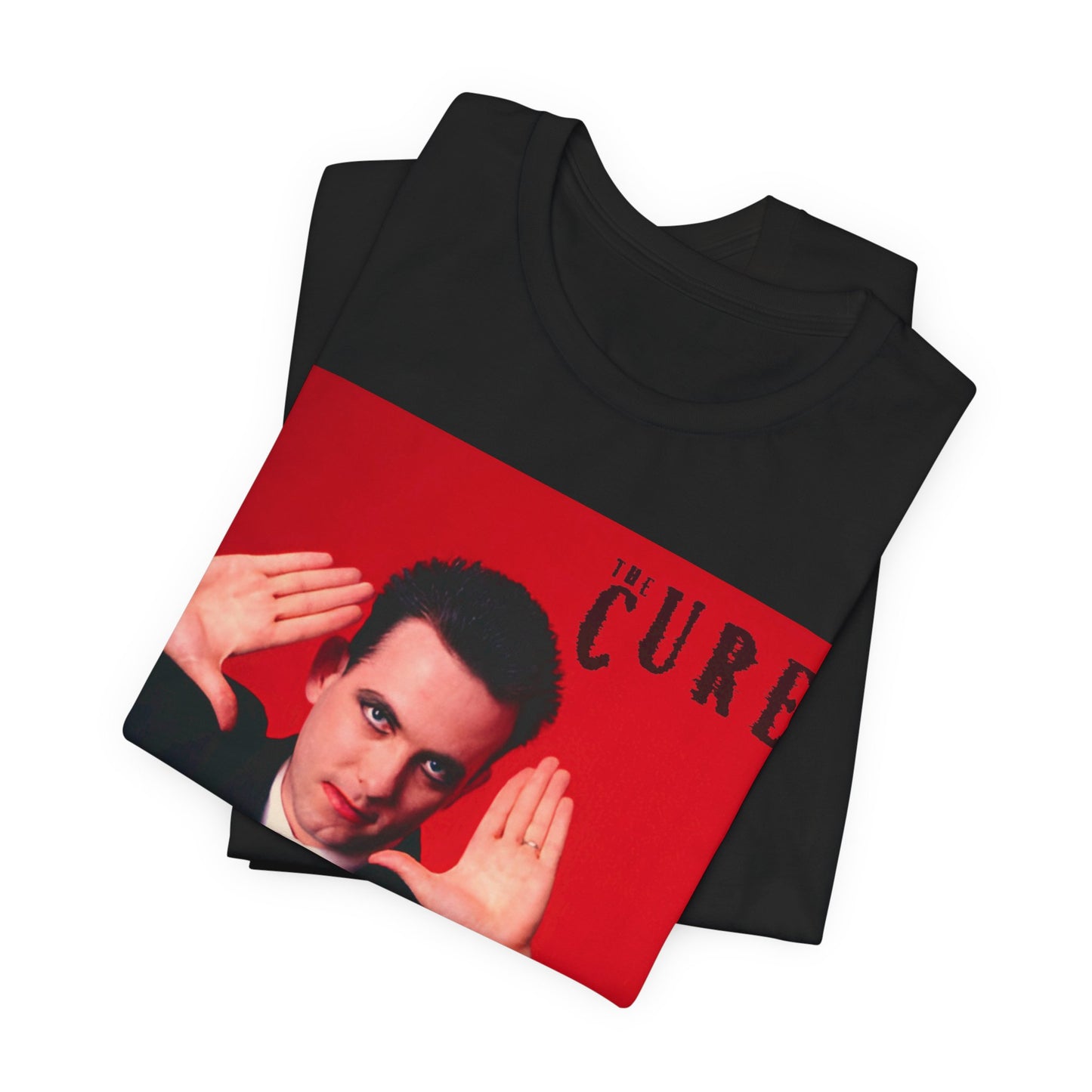 A black graphic t-shirt featuring a graphic of Robert Smith from The Cure in his authentic style.