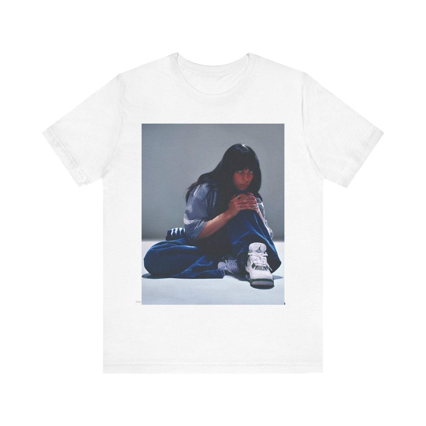 An artistic and slightly melancholic graphic t-shirt inspired by Billie Eilish's song "Lovely," featuring soft colors and a dreamy style.