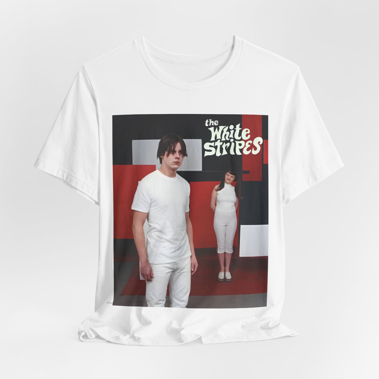 A black graphic t-shirt featuring a red and white aesthetic graphic of The White Stripes.