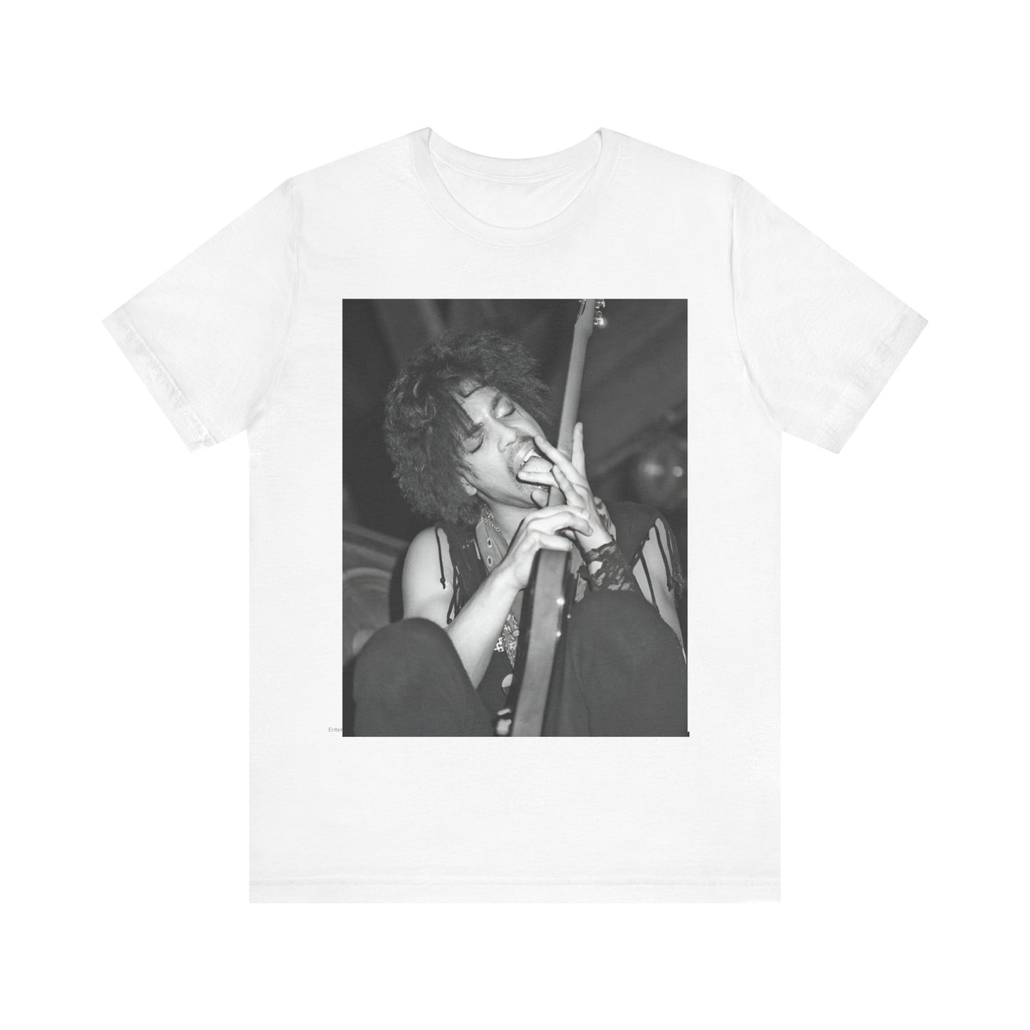 A black graphic t-shirt featuring a graphic or photo of Prince performing wildly on stage.