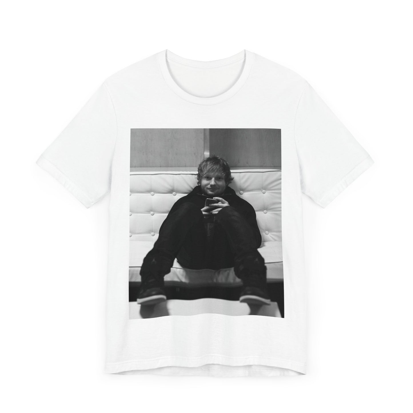 A black graphic t-shirt featuring a bold black and white graphic of Ed Sheeran.