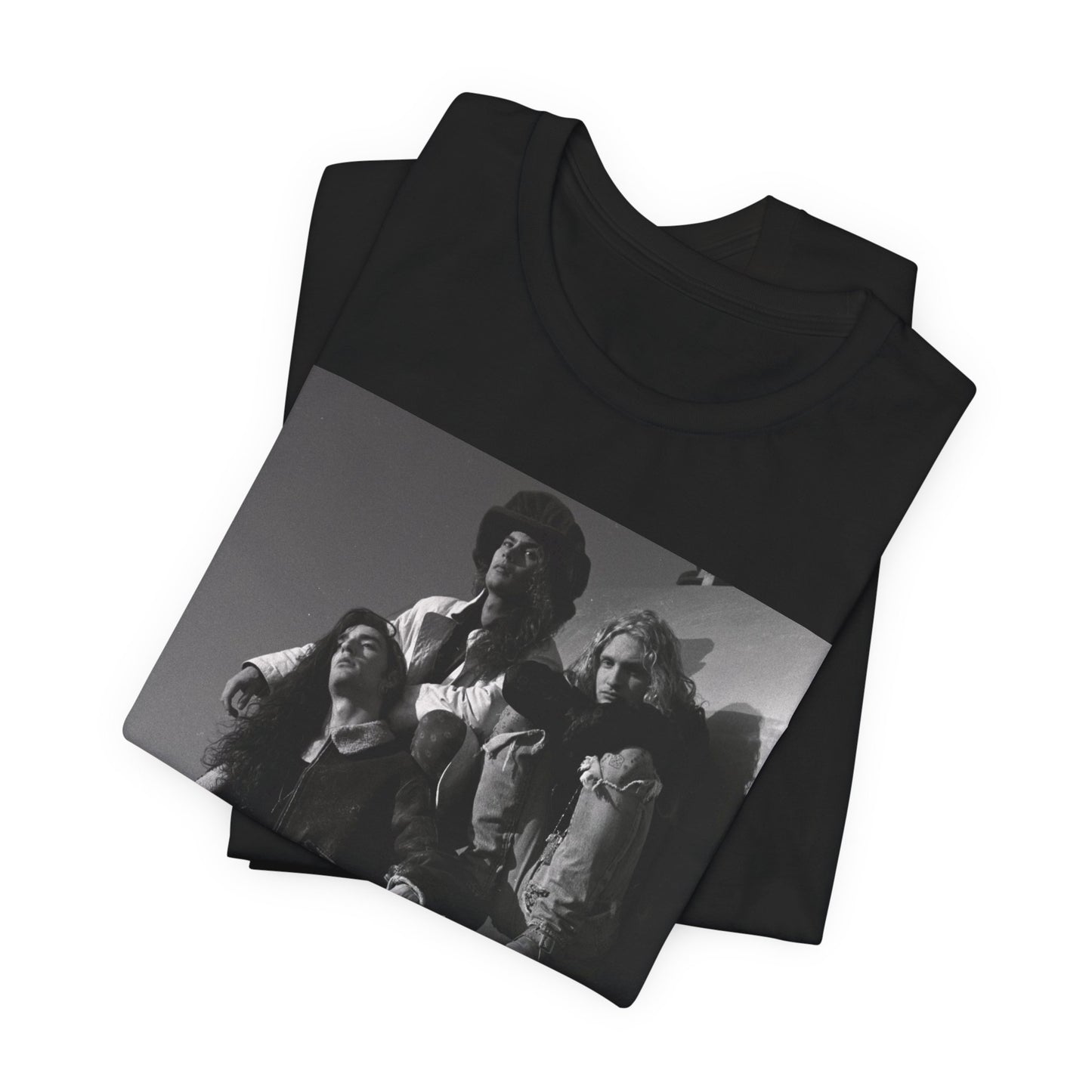 A black graphic t-shirt featuring a 90s black and white photographic portrait of the band Alice In Chains, capturing their iconic grunge look.