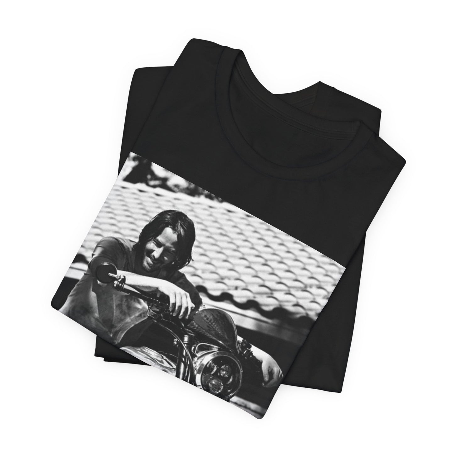A black graphic t-shirt featuring a black and white photo of Keanu Reeves on a motorcycle.