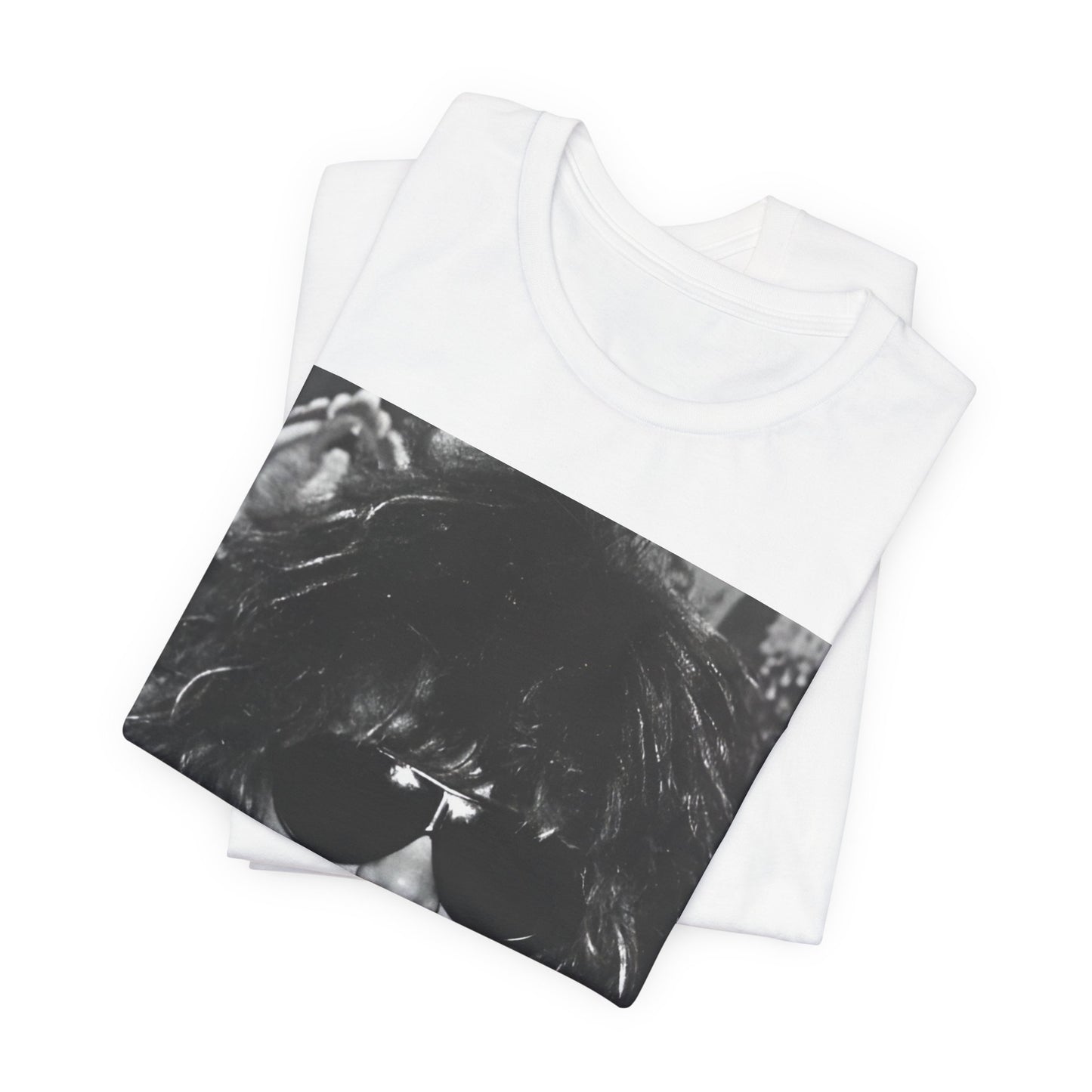 A black graphic t-shirt featuring a graphic or photo of Bon Jovi in a backstage setting.
