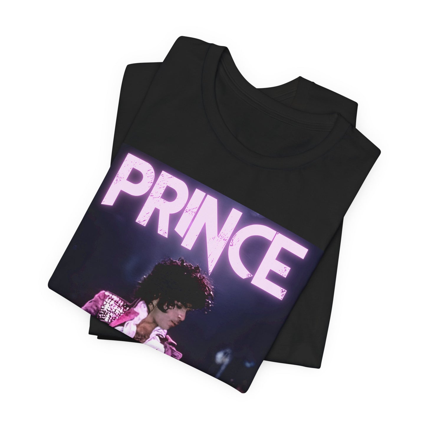 A black graphic t-shirt featuring an 80s pop genius graphic of Prince.