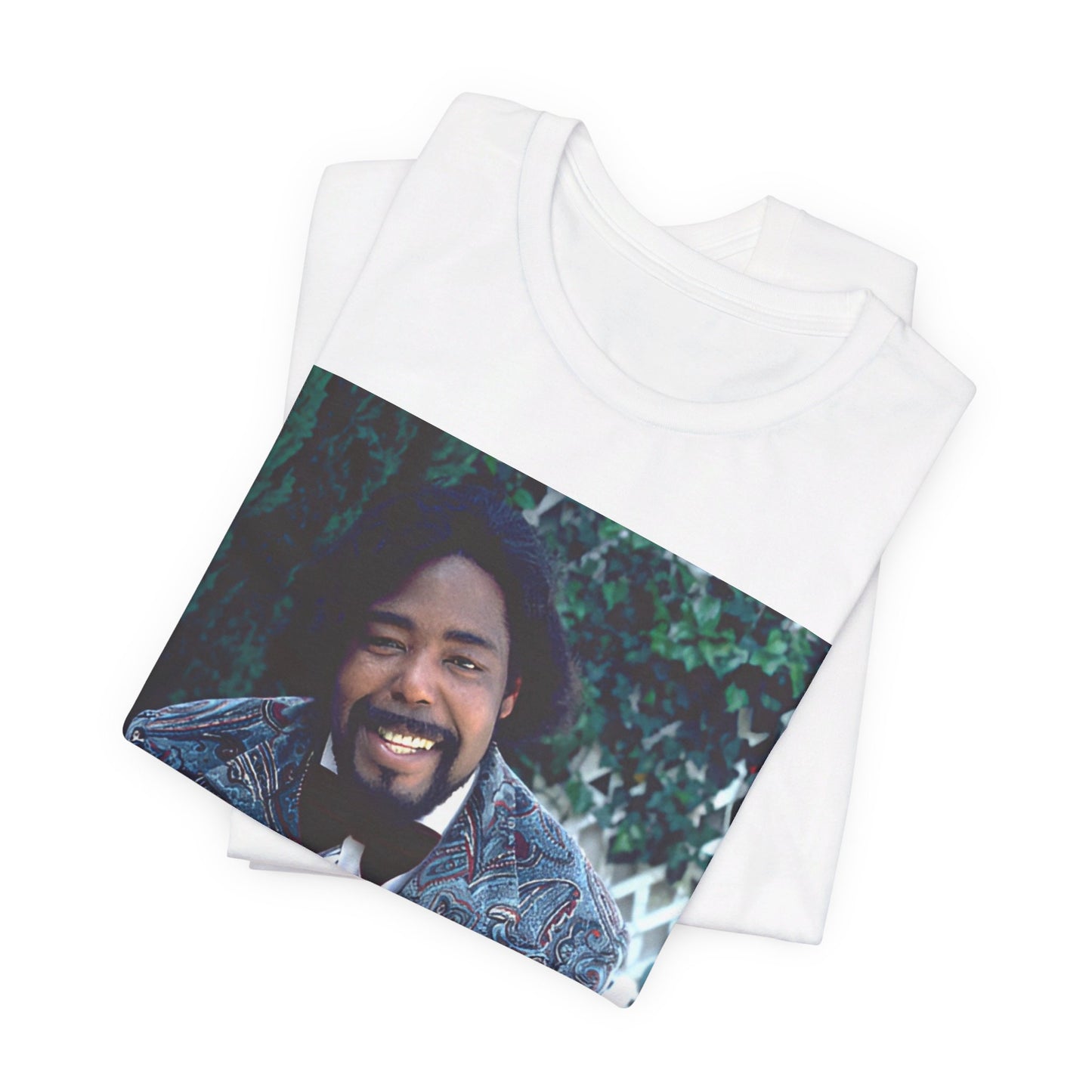 A black graphic t-shirt featuring a retro 70s photo of Barry White, evoking the disco era.