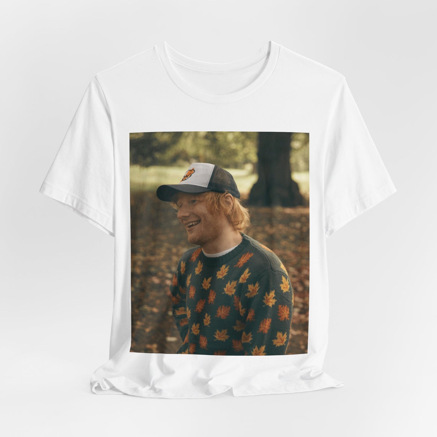 A black graphic t-shirt featuring a graphic related to Ed Sheeran's 'Shape of You' song or era.