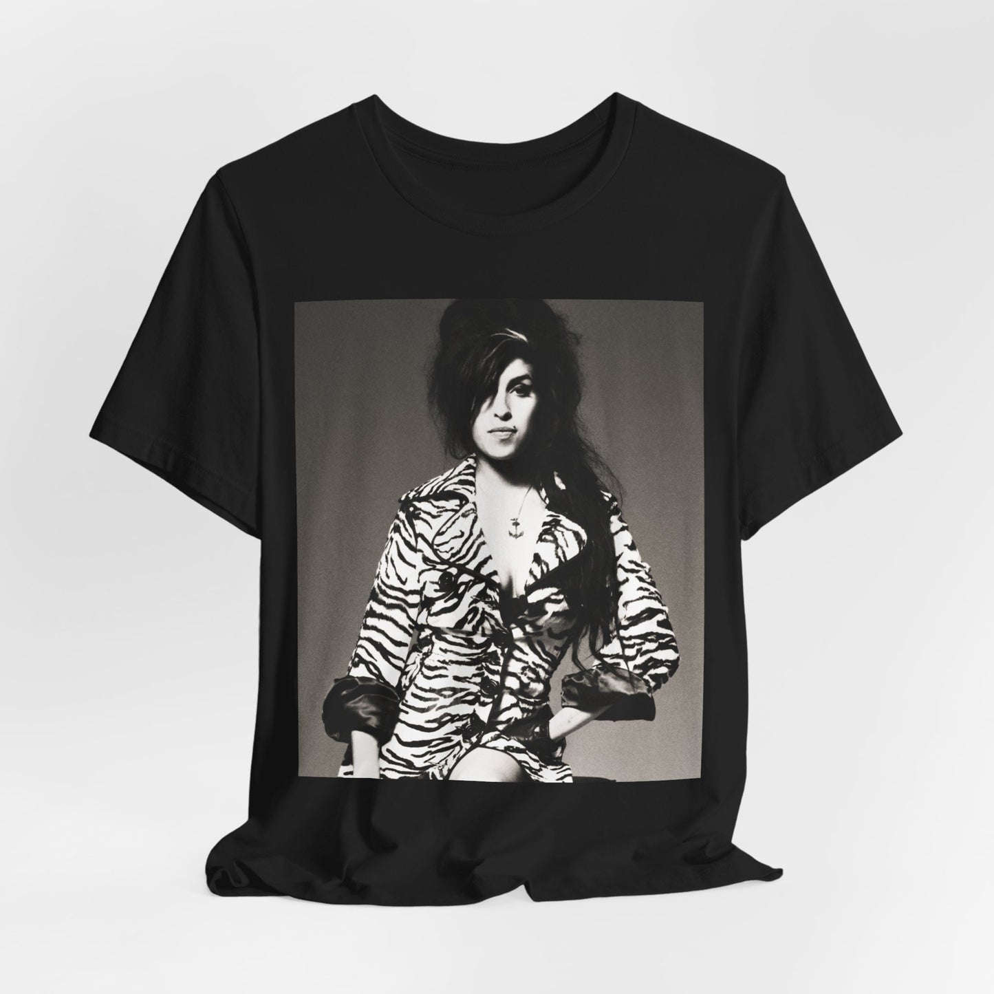 A black graphic t-shirt featuring a graphic related to Amy Winehouse's 'Back to Black' album era from 2006, possibly with album art elements.