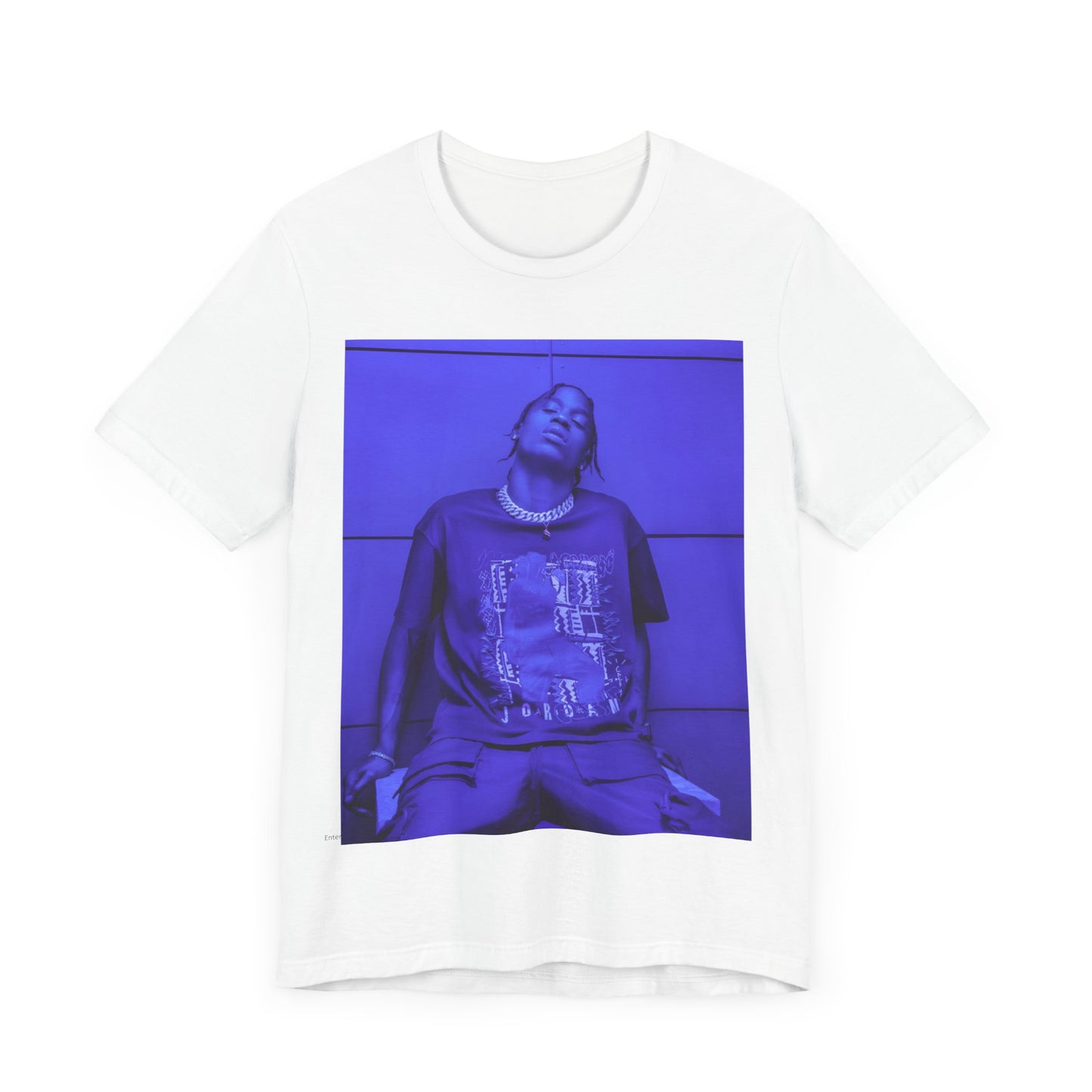 A black graphic t-shirt featuring a timeless trap star graphic of Travis Scott.