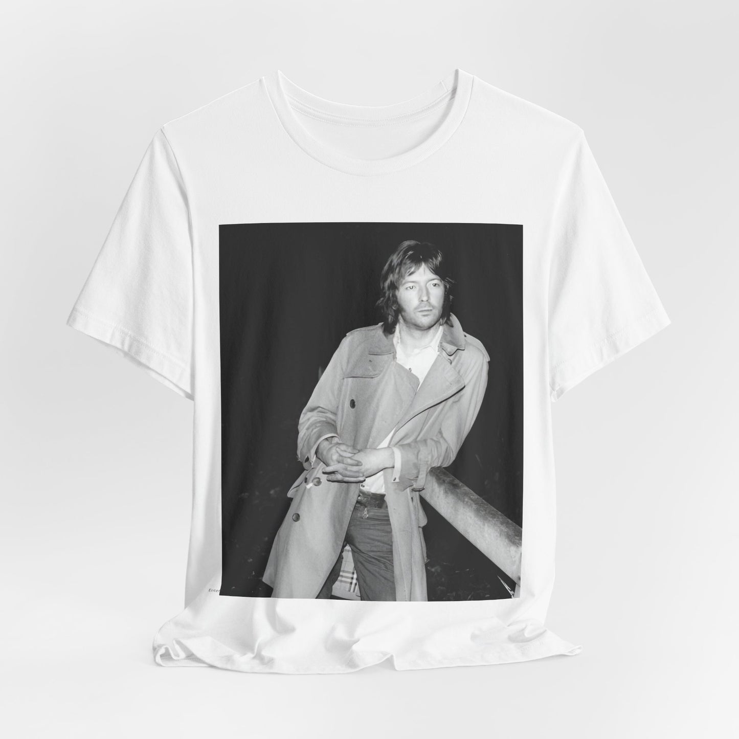 A black graphic t-shirt featuring a retro graphic of Eric Clapton as a blues master.