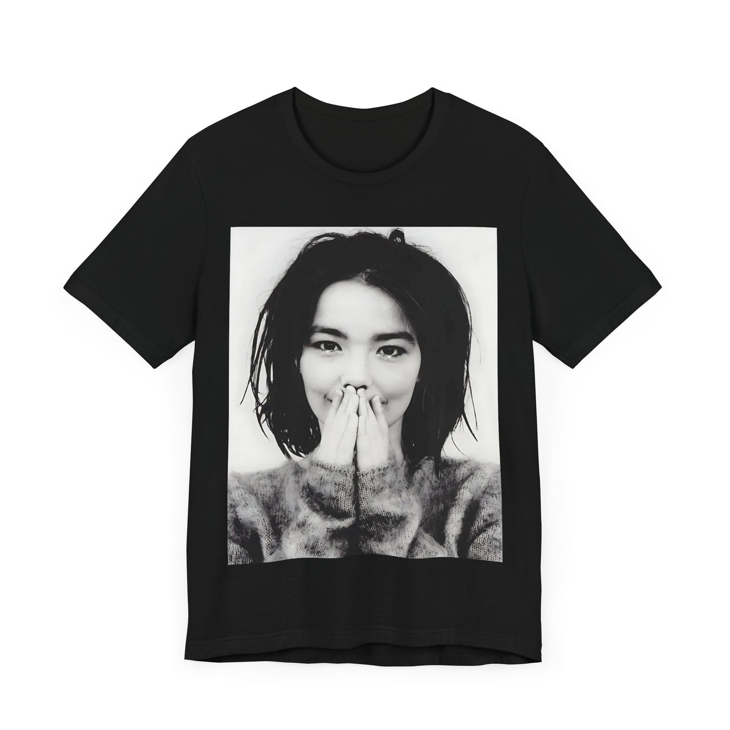 A black graphic t-shirt featuring a 90s black and white photographic portrait of Bjork.