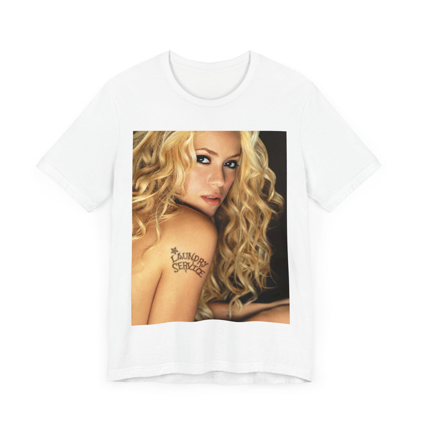 A black graphic t-shirt featuring a glamorous portrait graphic of Shakira.