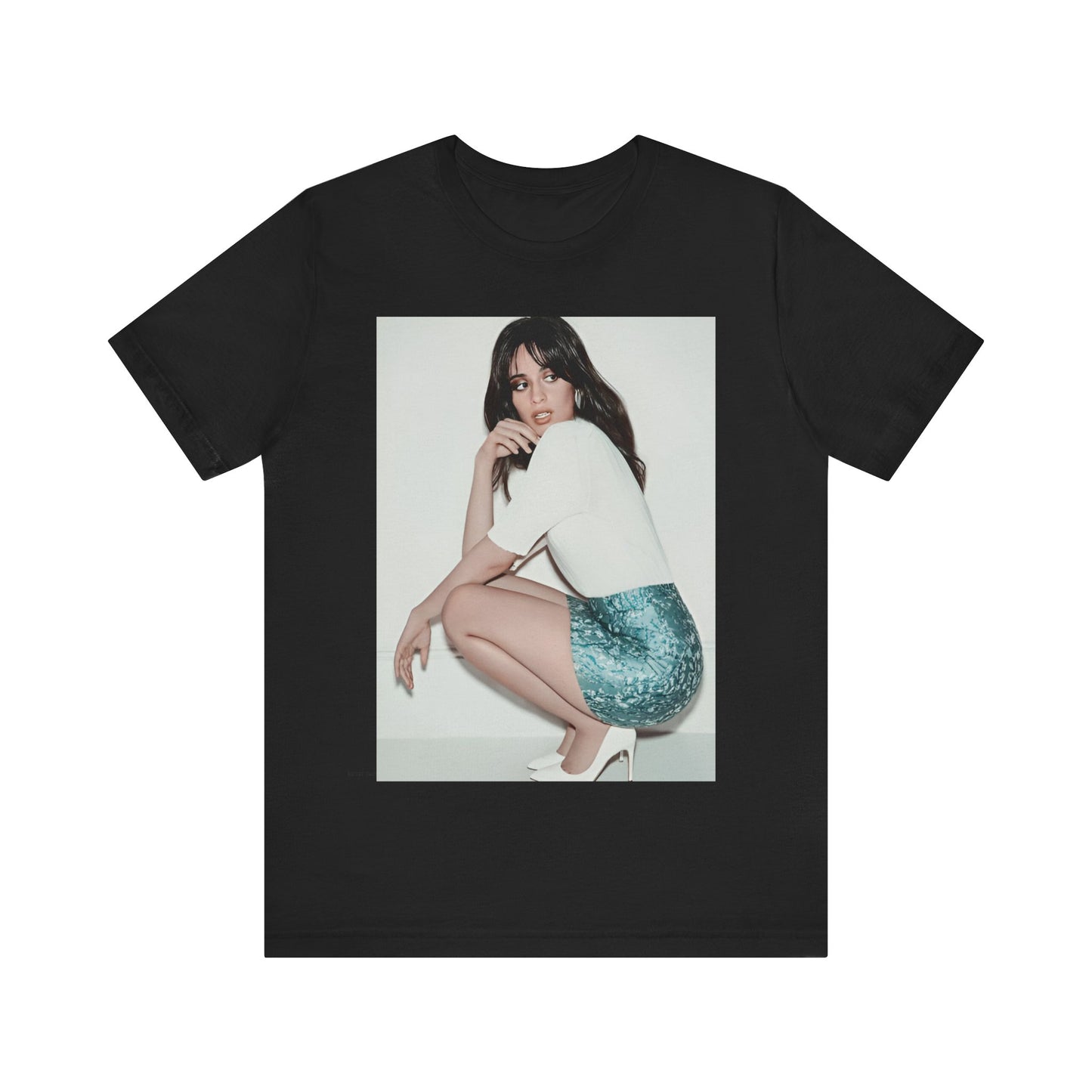 A black graphic t-shirt featuring a stylized graphic of Camila Cabello as a Latin pop princess.