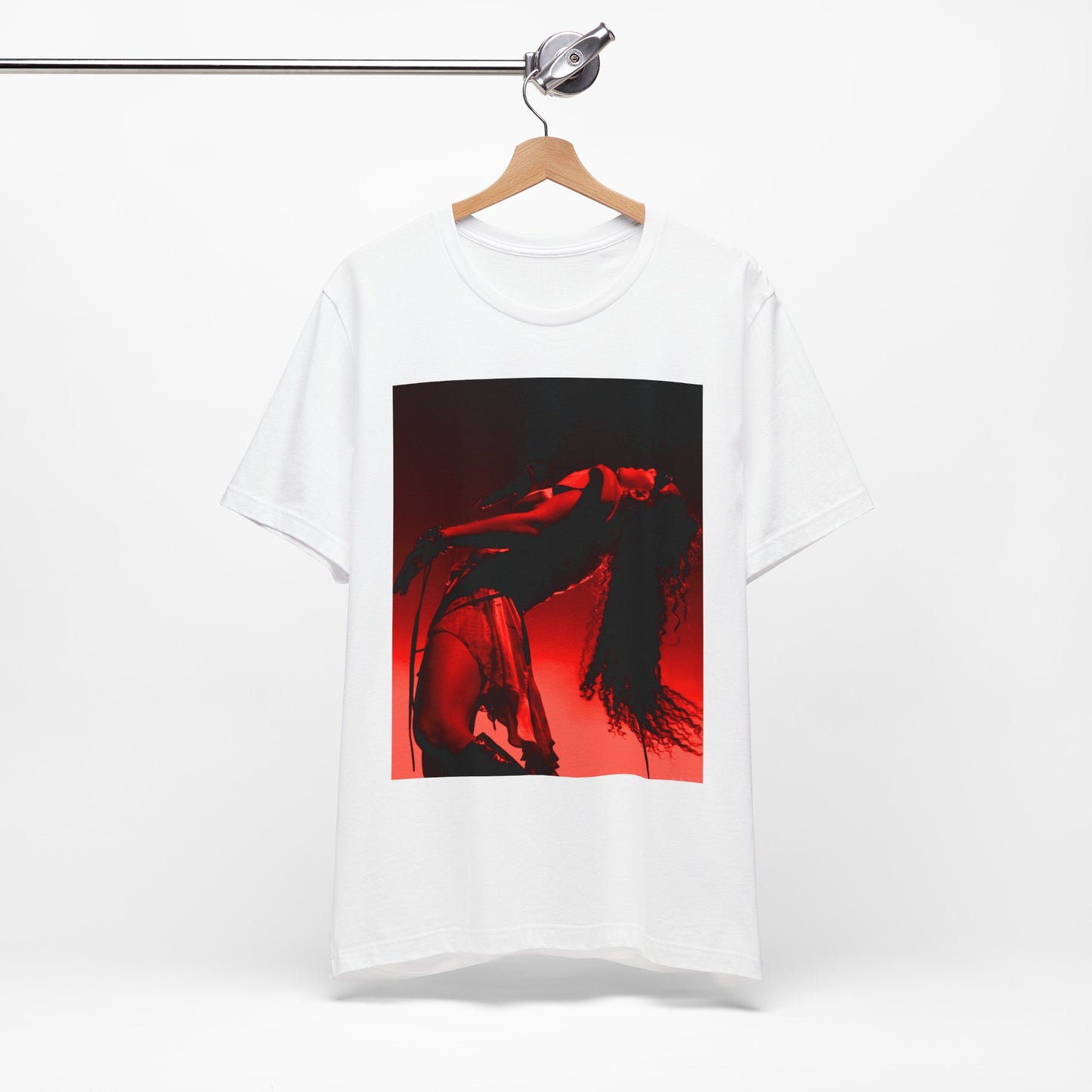 A black graphic t-shirt featuring a graphic of Charli XCX, designed with a future pop aesthetic.