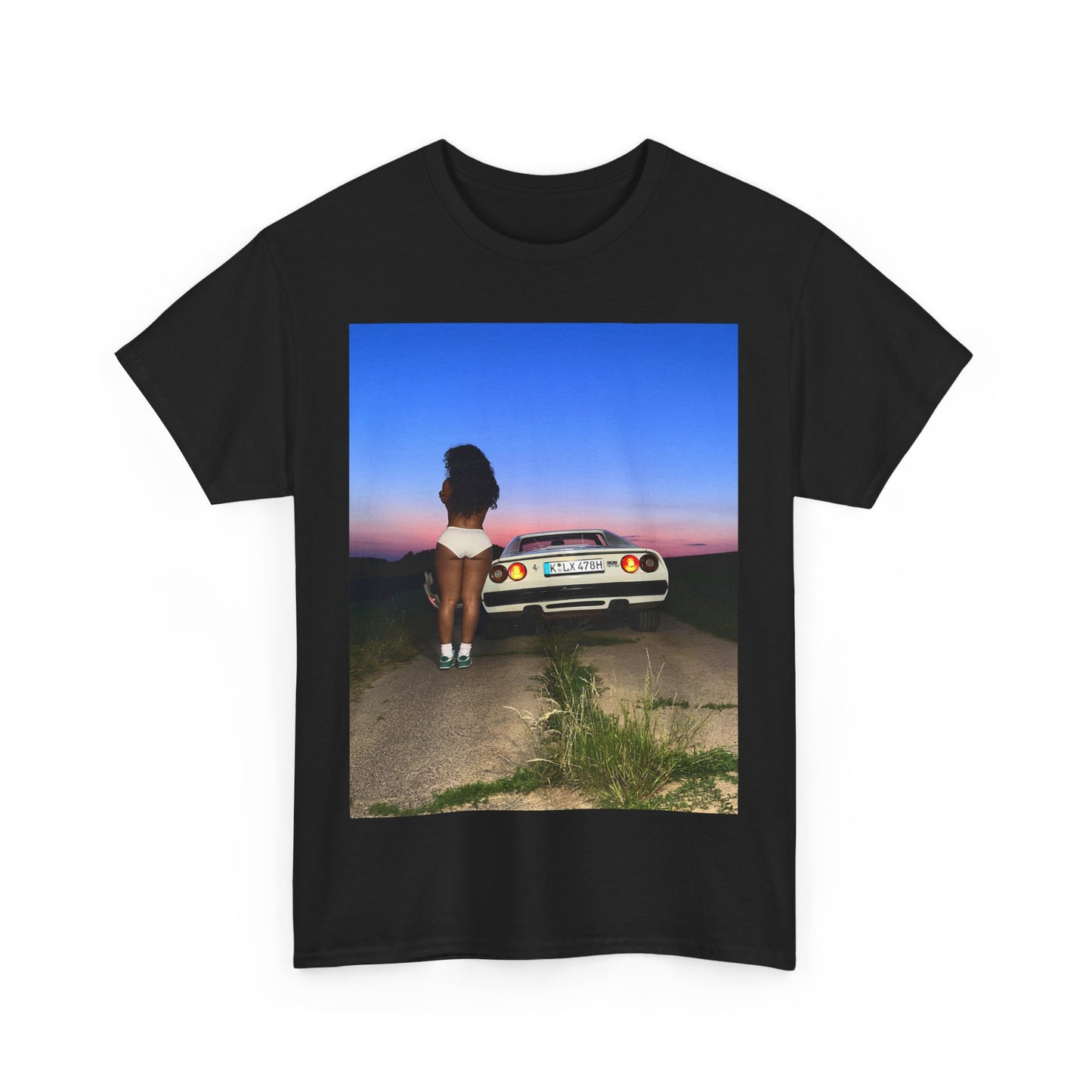 A black graphic t-shirt featuring a vintage alt R&B graphic of SZA.