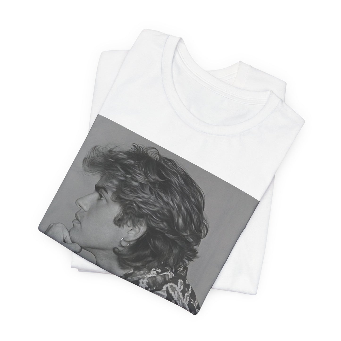 A black graphic t-shirt featuring a graphic of George Michael from his 80s Wham! era.