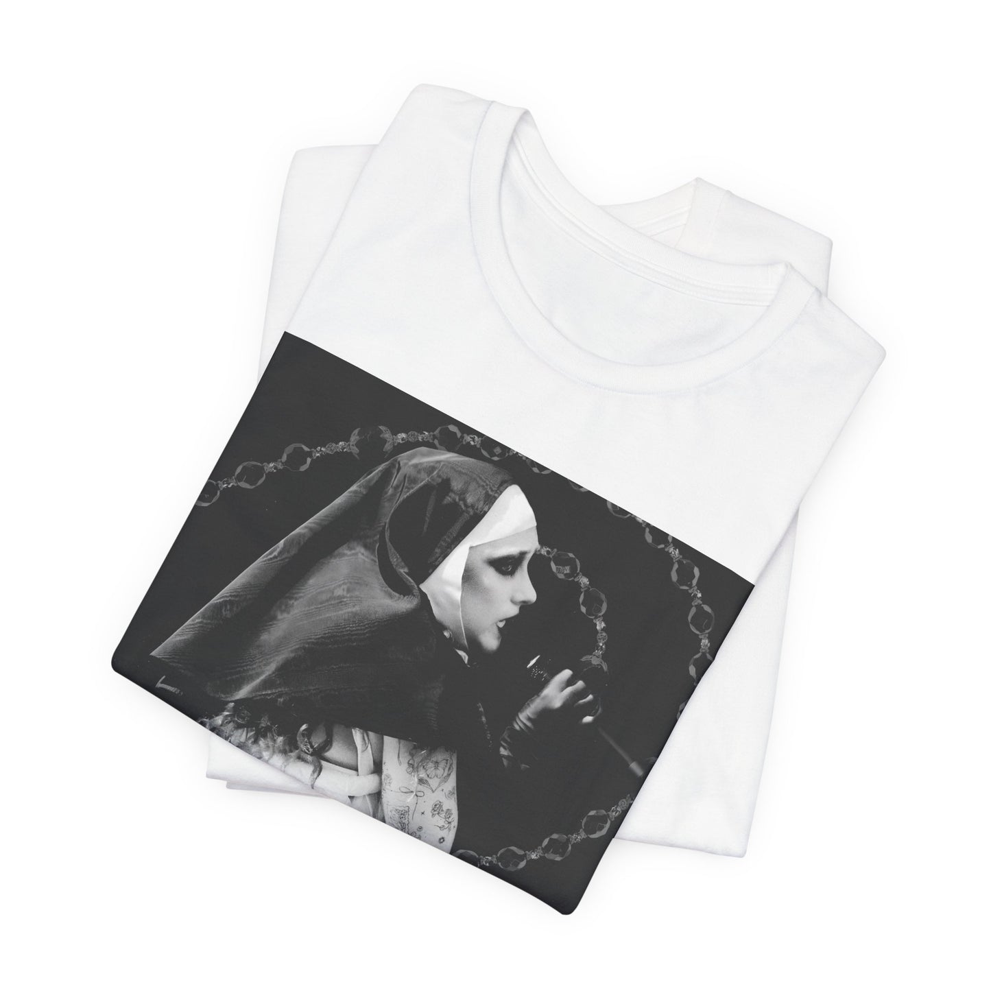 A black graphic t-shirt featuring a retro glam-style graphic of Chappell Roan dressed as a nun.