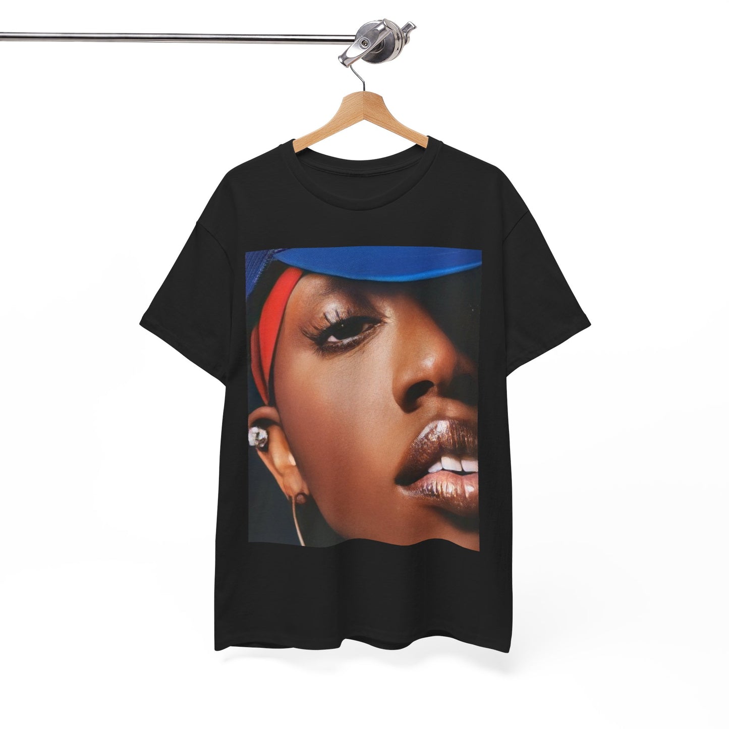 A black graphic t-shirt featuring a graphic of Missy Elliott as a creative genius in hip hop.