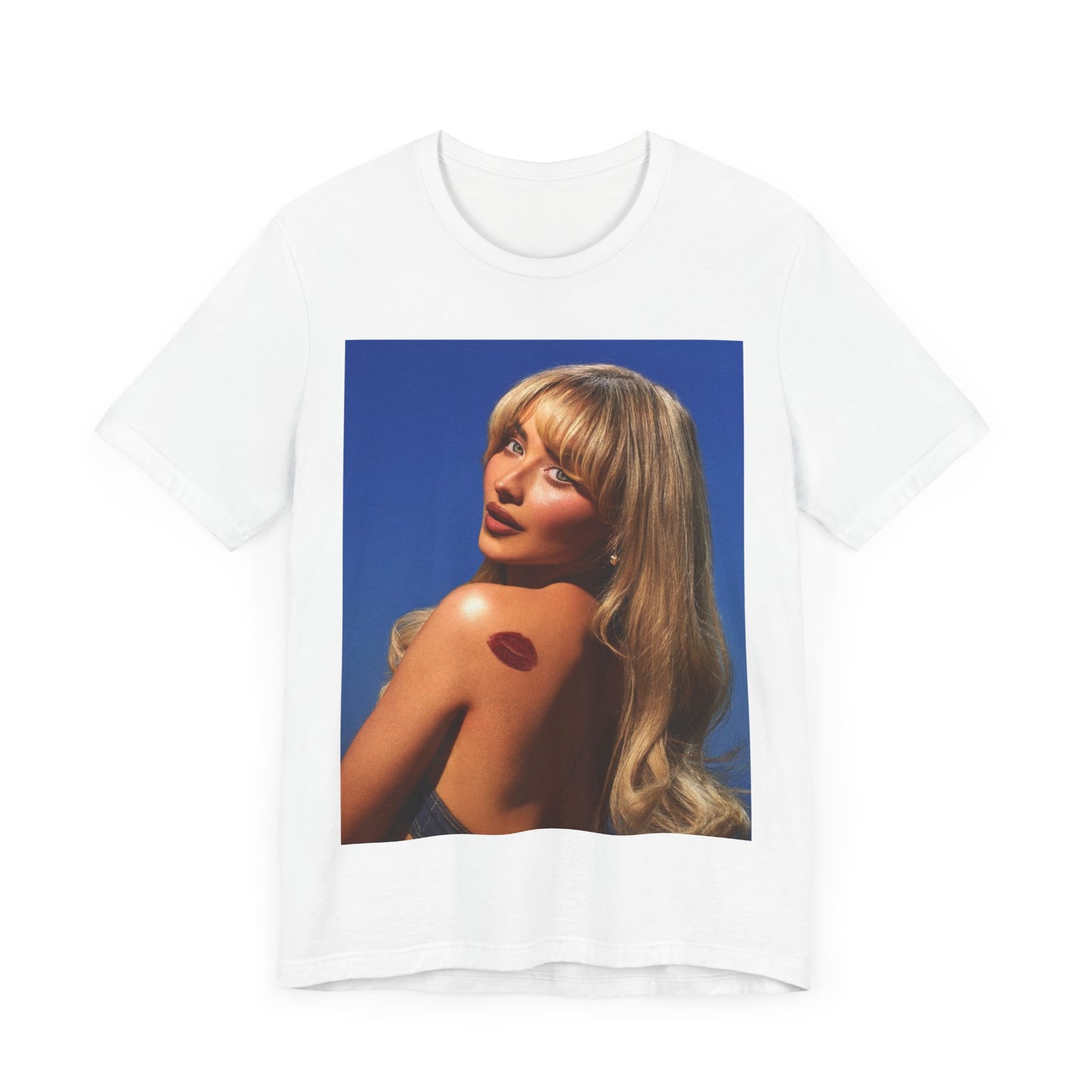 A black graphic t-shirt featuring a stylized graphic of Sabrina Carpenter, designed with a modern pop aesthetic.