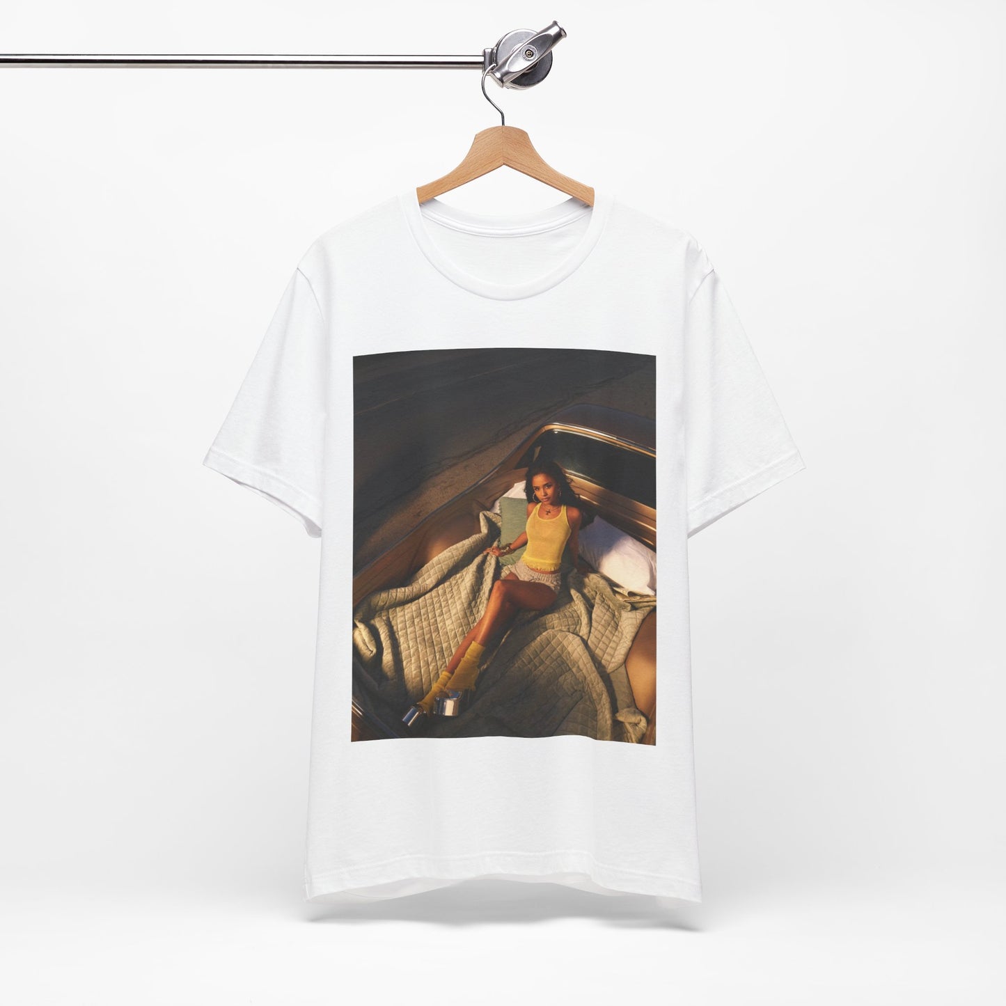 A black graphic t-shirt featuring a graphic of Tyla as an African fashion icon.