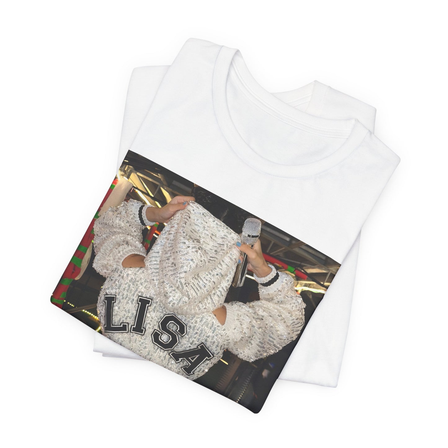 A black graphic t-shirt featuring a graphic or photo of Lisa in a backstage setting.