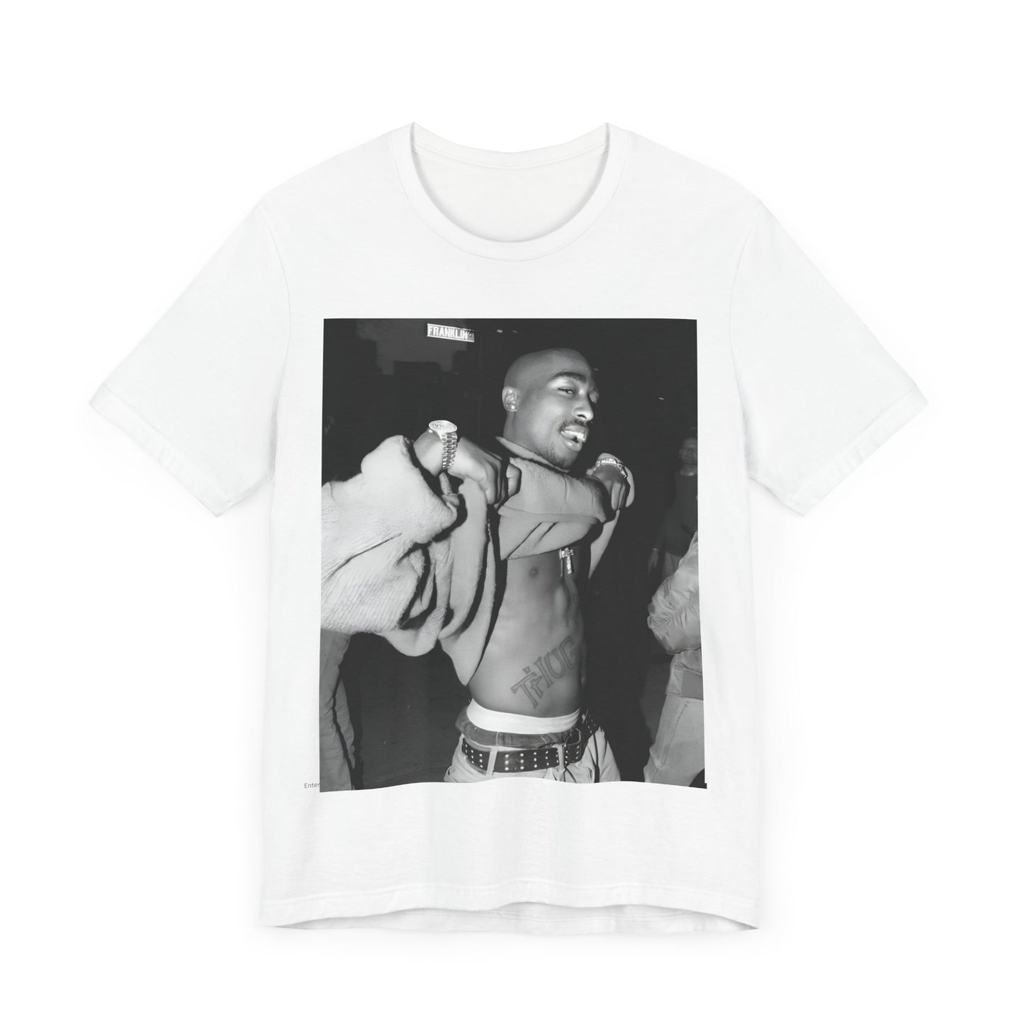 A black graphic t-shirt featuring a vintage hip hop icon graphic of Tupac.