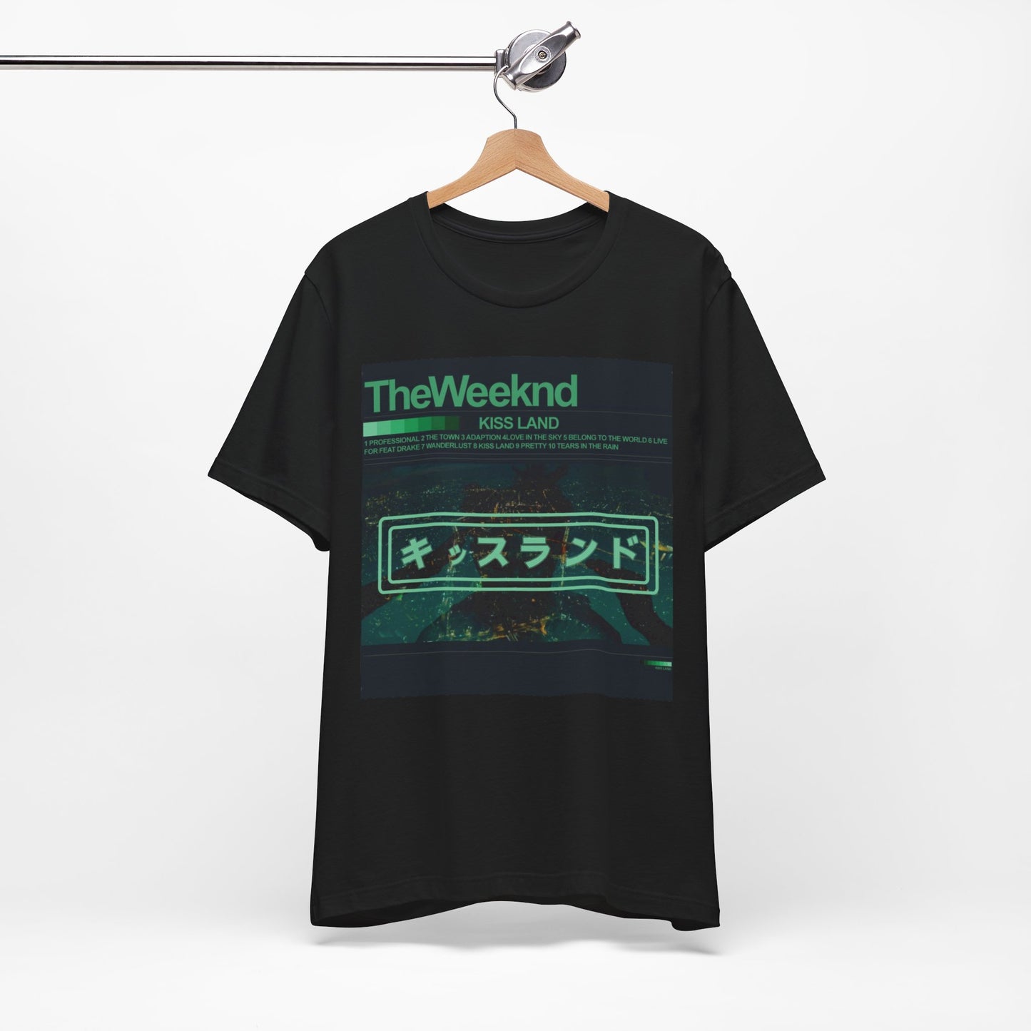 A black graphic t-shirt featuring a retro graphic related to The Weeknd's 'Kiss Land' album.
