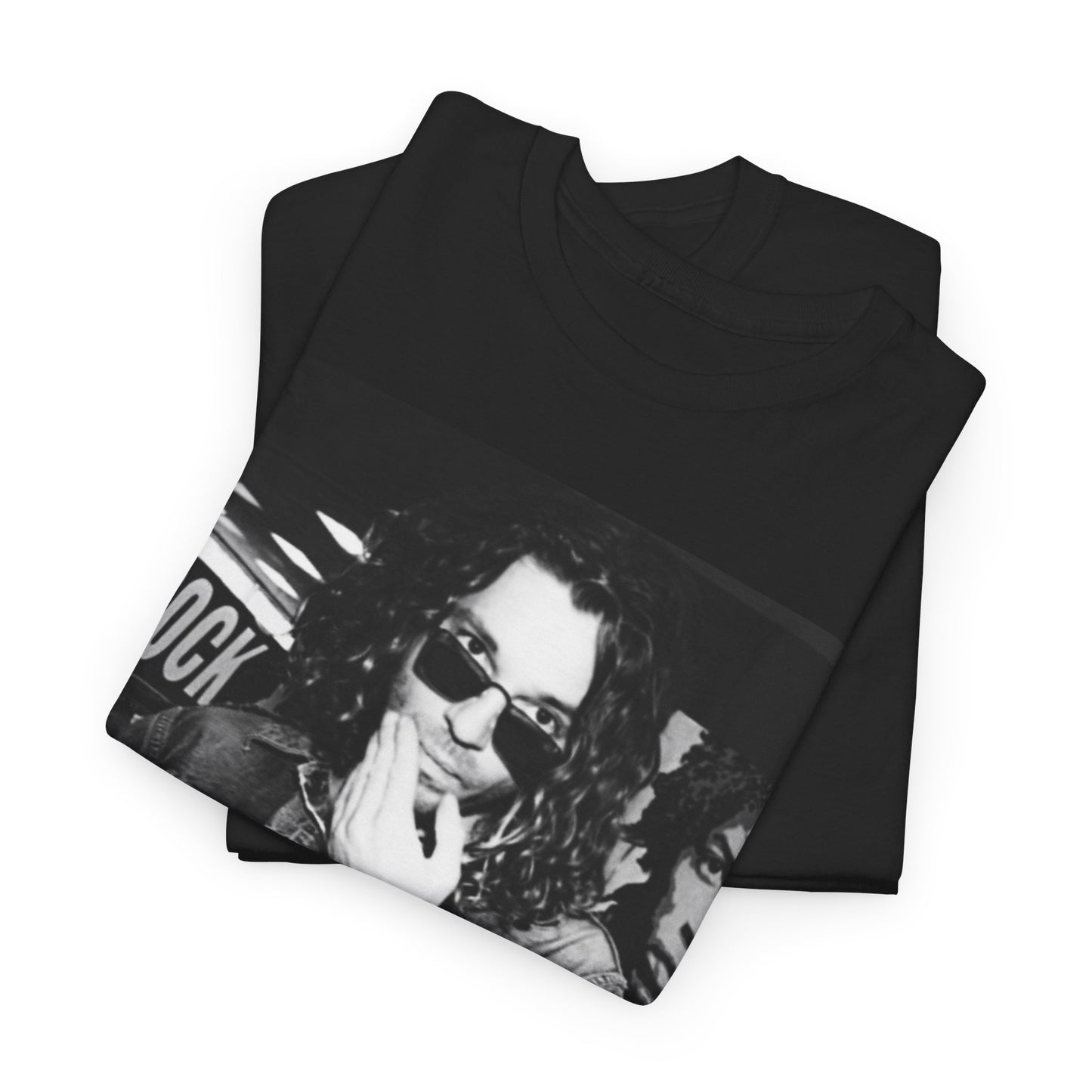 A black graphic t-shirt featuring a black and white, monochrome graphic or photo of INXS.