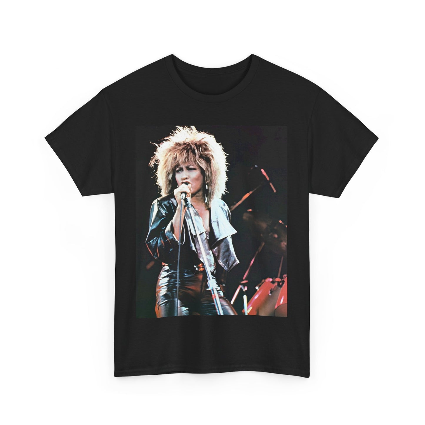 A black graphic t-shirt featuring a 90s graphic or photo of Tina Turner performing live on stage.