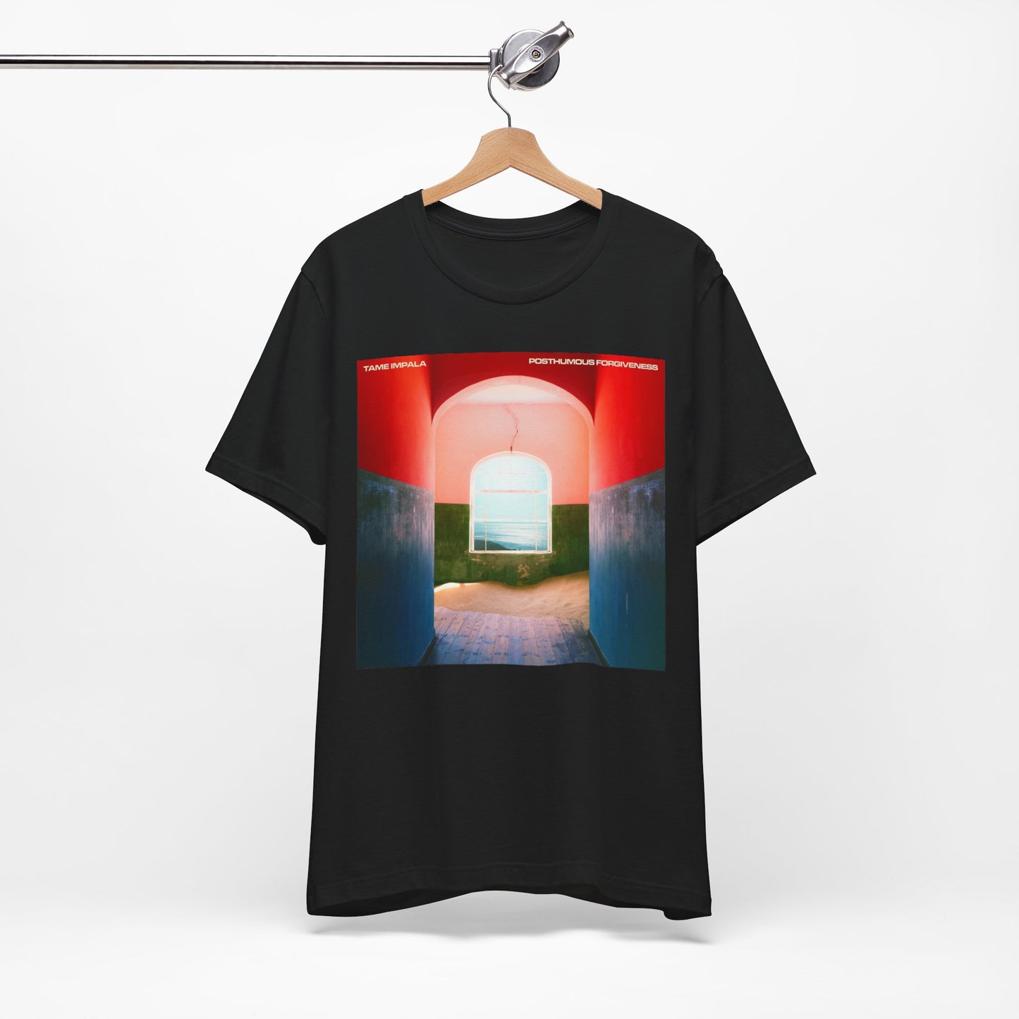 A black graphic t-shirt featuring a graphic related to Tame Impala's song 'Posthumous Forgiveness'.