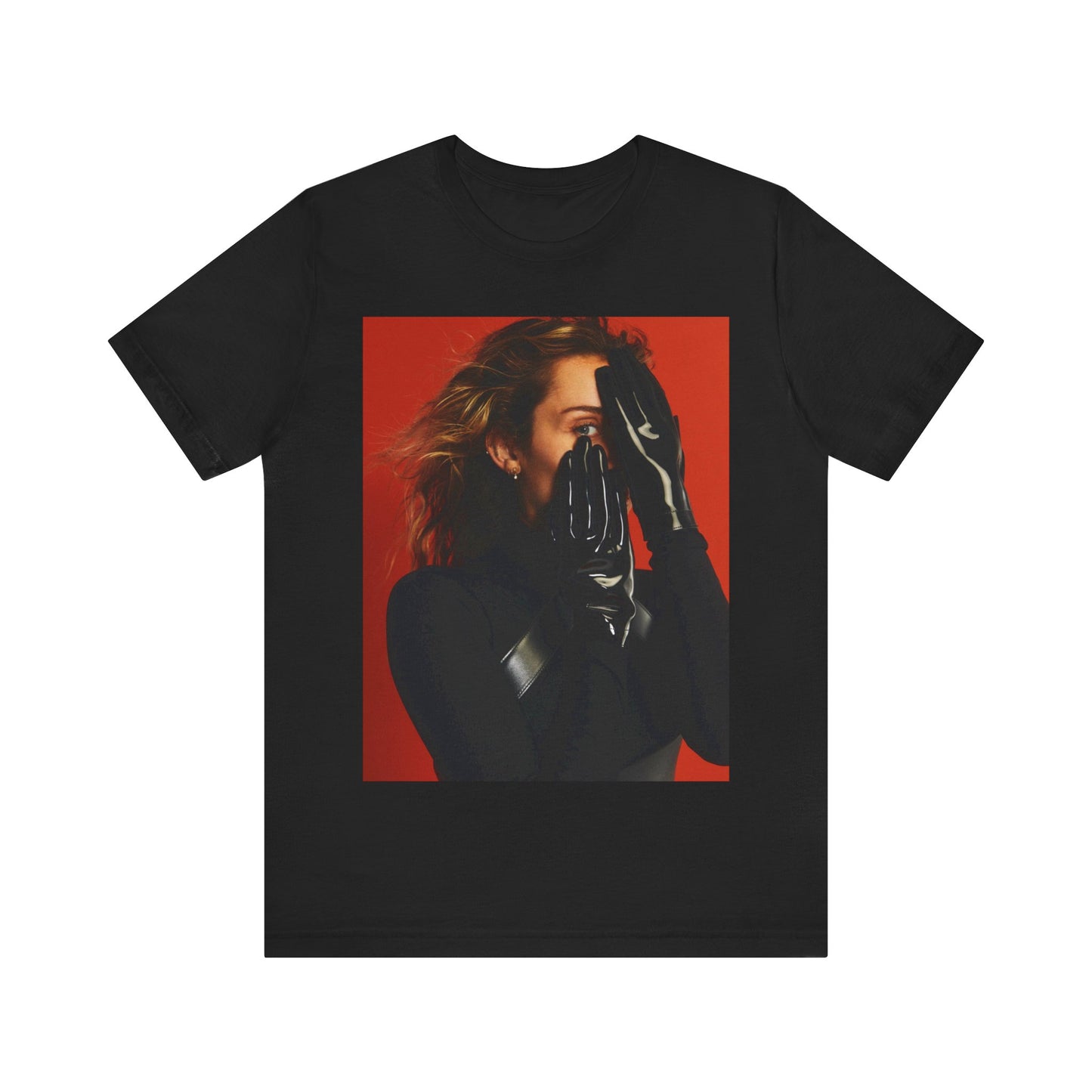 A black graphic t-shirt featuring a graphic of Miley Cyrus with Nashville or country music elements.