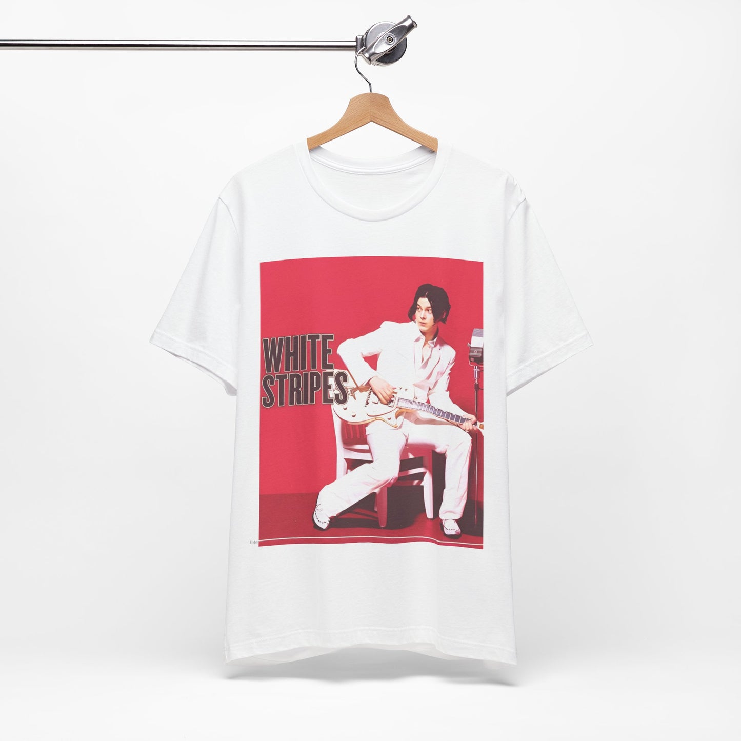 A black graphic t-shirt featuring a graphic related to The White Stripes' 'Fell In Love With A Girl' song or era.