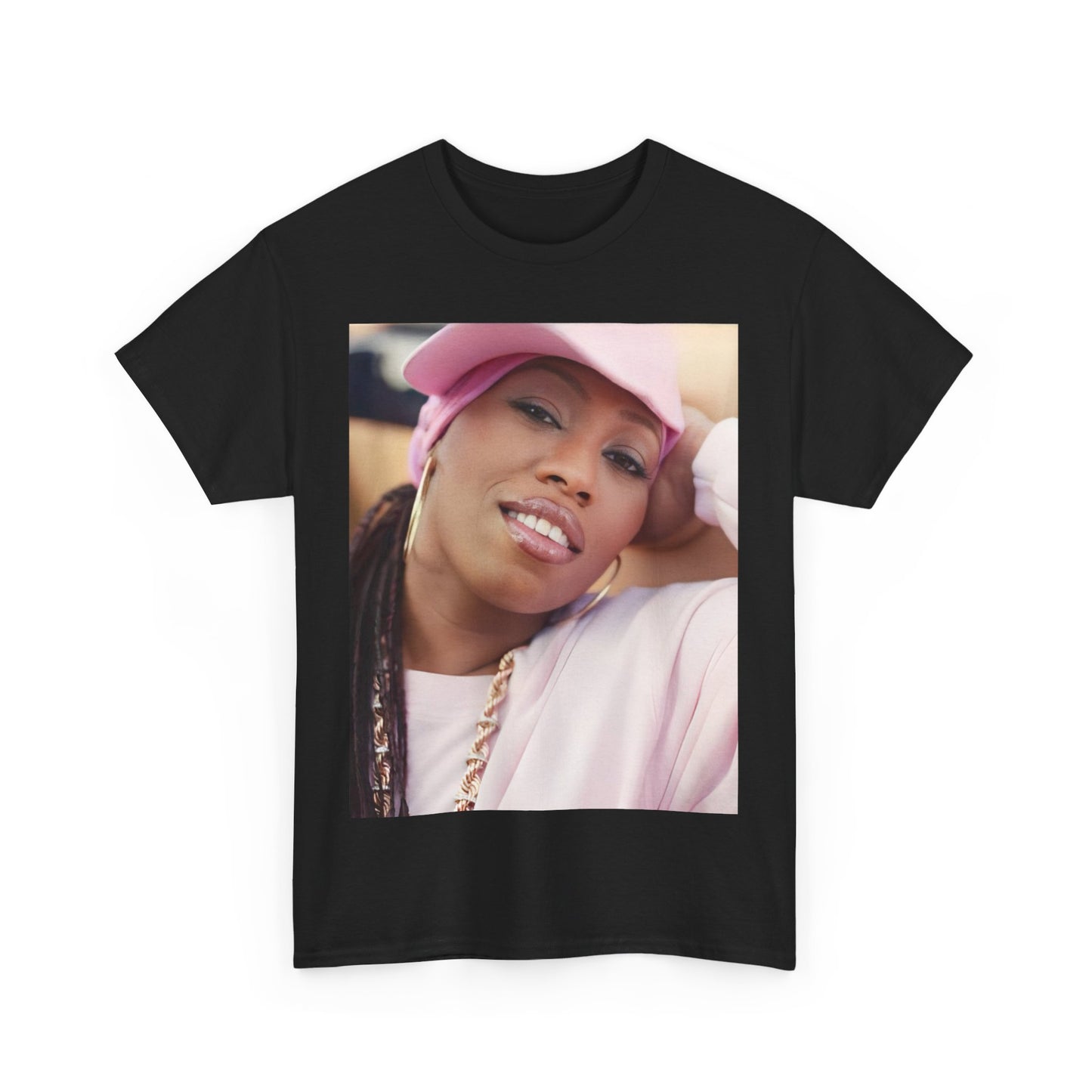 A black graphic t-shirt featuring a 90s rap graphic of Missy Elliott from her early days, emphasizing a raw style.
