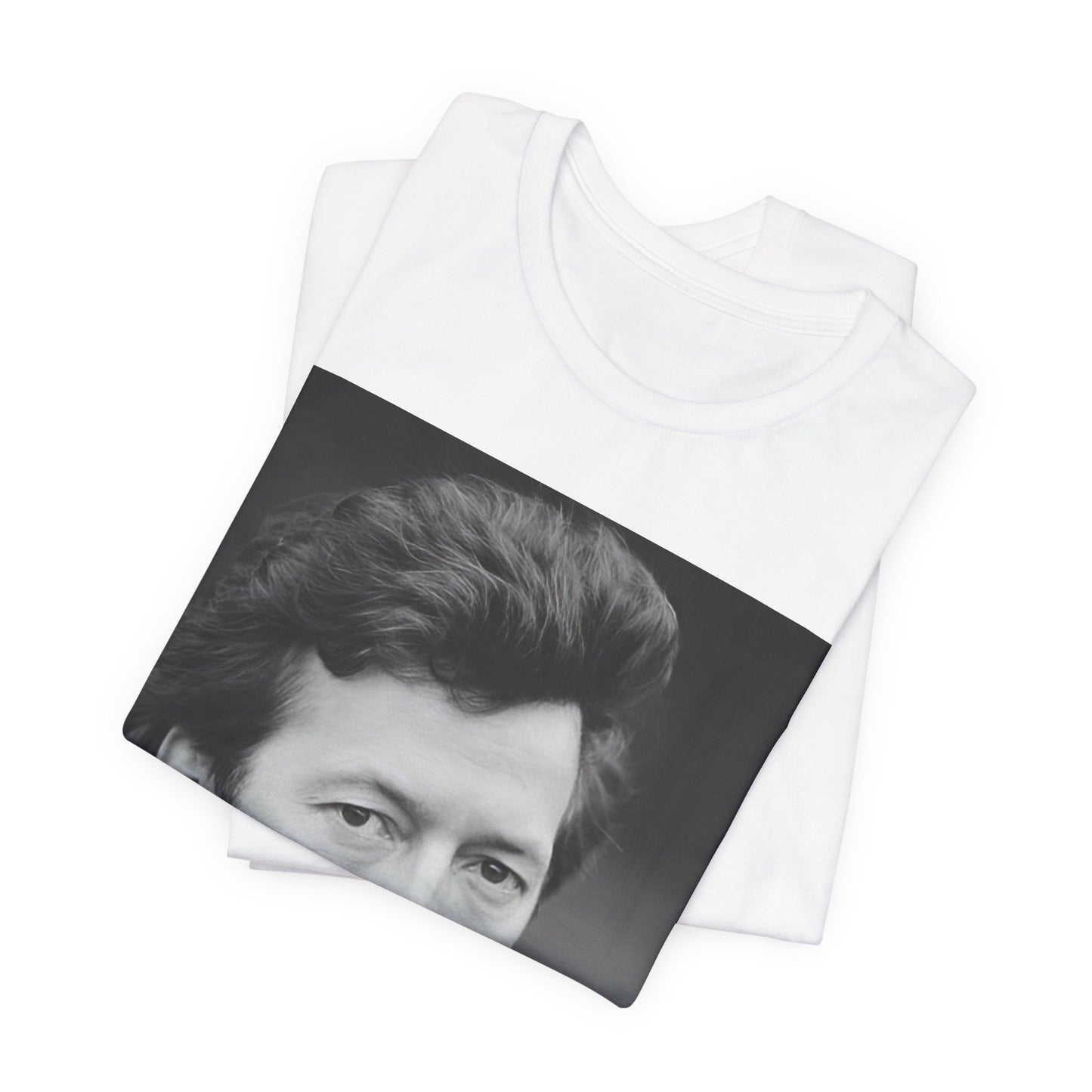 A black graphic t-shirt featuring a 70s rock aesthetic graphic of Eric Clapton.