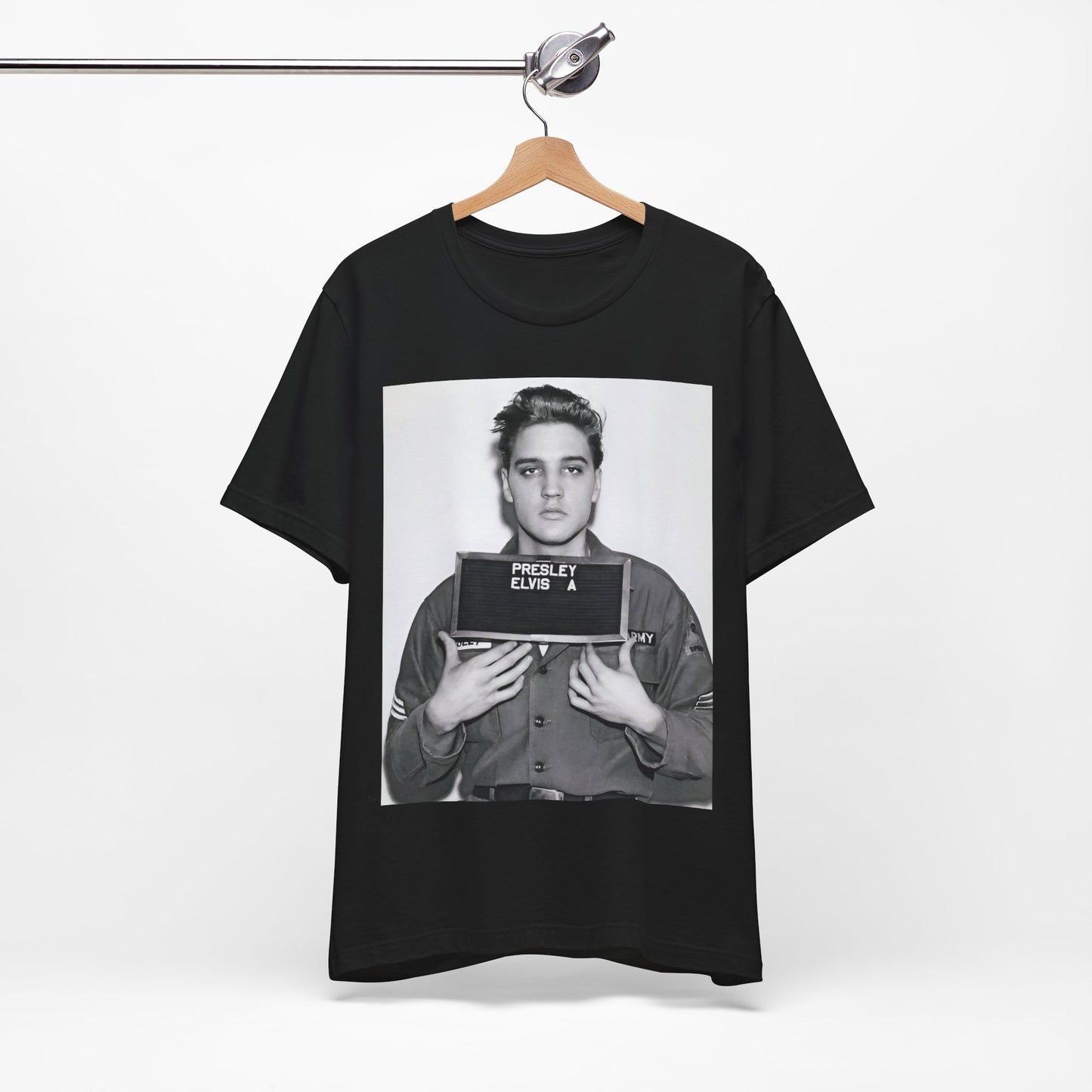 A black graphic t-shirt featuring a retro mugshot photo of Elvis Presley.