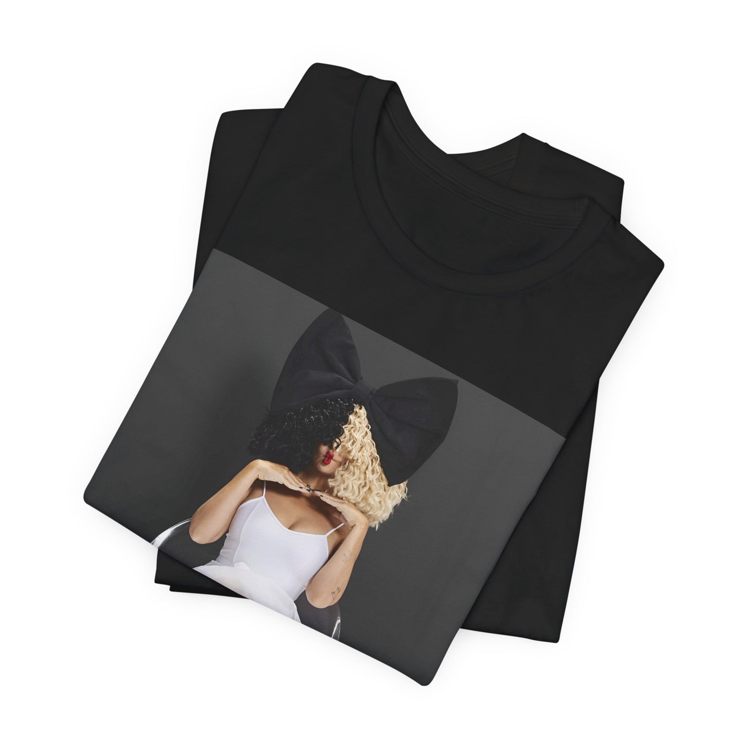 A black graphic t-shirt featuring a graphic of Sia's iconic wig style.